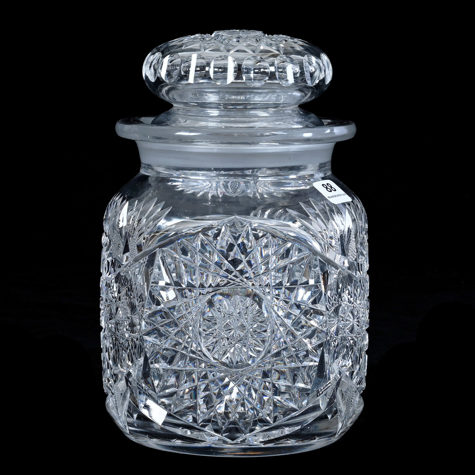 Humidor, American Brilliant Cut Glass: Humidor, American Brilliant Cut Glass, 9 x 5.5 x 5.5 Inches, Three Alternating Sections Of Hobstar, Flat Star, Crosscutting, And Fan Motif, Hobstar Cut Lid And Base, 5.2 Pounds, John And Doris Carty E
