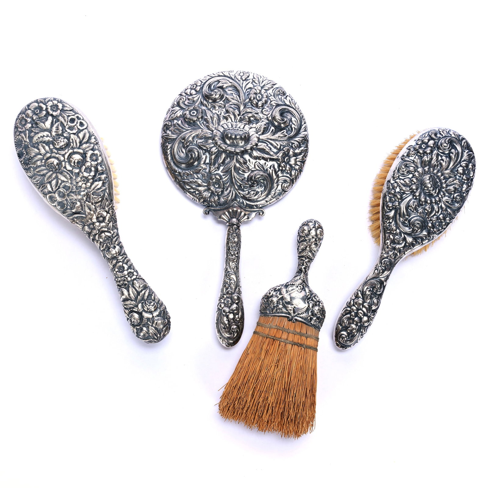 (4) Embossed Sterling Silver Vanity Items: (4) Embossed Sterling Silver Vanity Items, 10.5 x 5.5 x 1 Inches, (1) 10.5" x 5.5" Hand Mirror, (1) 9.5" x 3" Hairbrush, (1) 9" x 3" Hairbrush, And (1) 7.5" x 2.5" Whisk Broom, Various Makers, 1.9