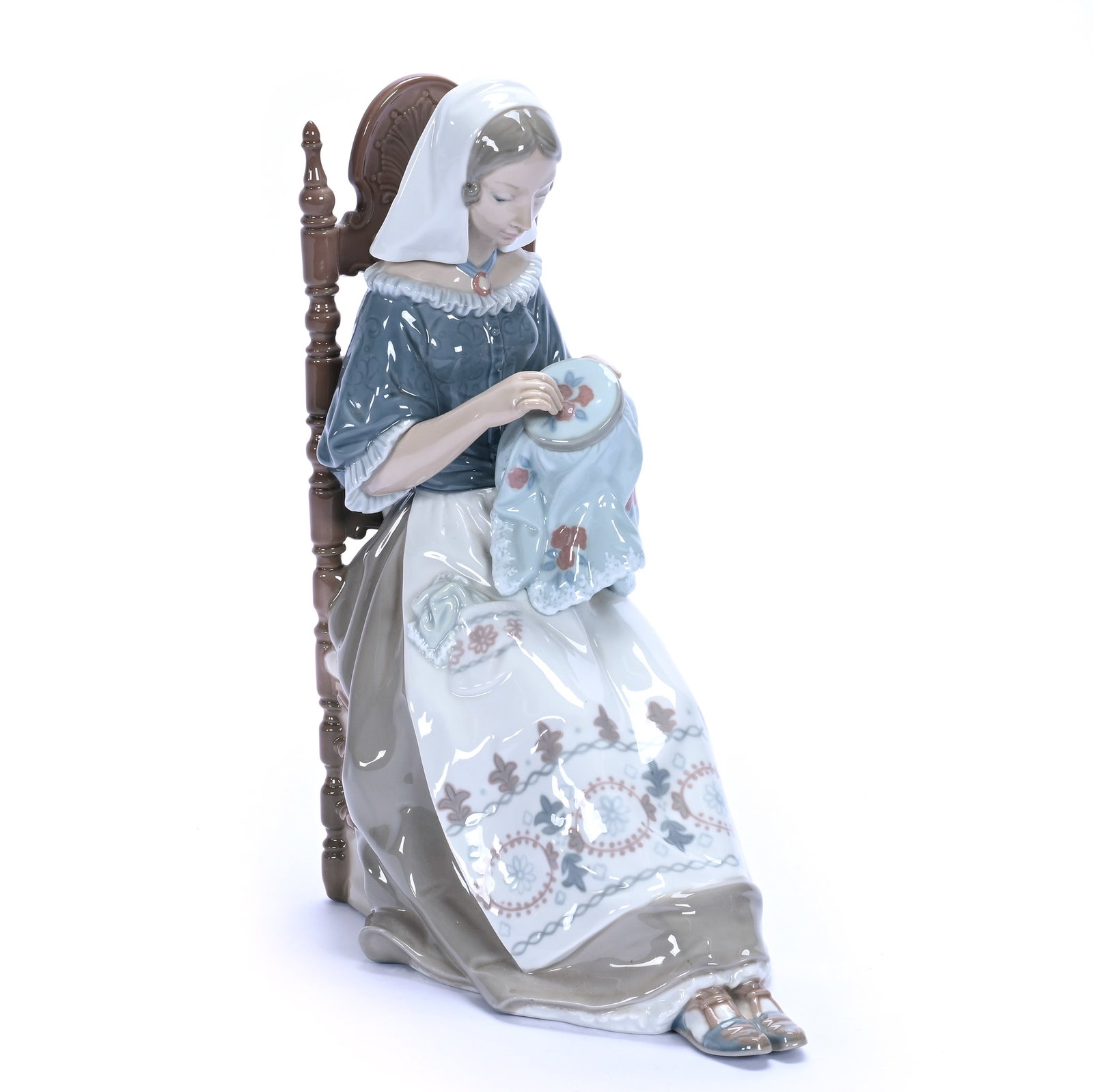 Figurine, Marked Lladro: Figurine, Marked Lladro, 11.25 x 8.5 x 5 Inches, Titled "Embroiderer", 3.2 Pounds, Grady and Annette Hite Collection, North Carolina. Effective 6/6/26, All LiveAuctioneers Invoices Must Be Paid Using
