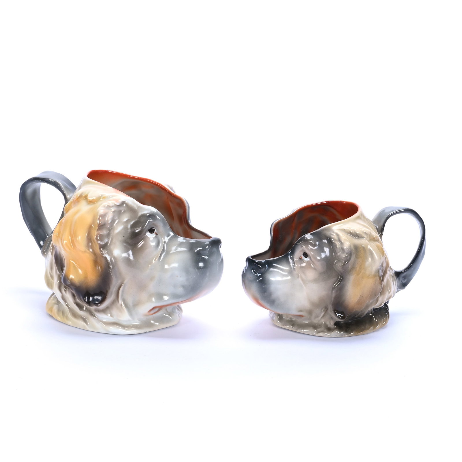 Milk Pitcher And Creamer, Unmarked Royal Bayreuth: Milk Pitcher And Creamer, Unmarked Royal Bayreuth, 3.75 x 6.25 x 4 Inches, Figural Saint Bernards, (1) 3.25" Creamer, 1 Pound, Grady and Annette Hite Collection, North Carolina. Effective 6/6/26, All