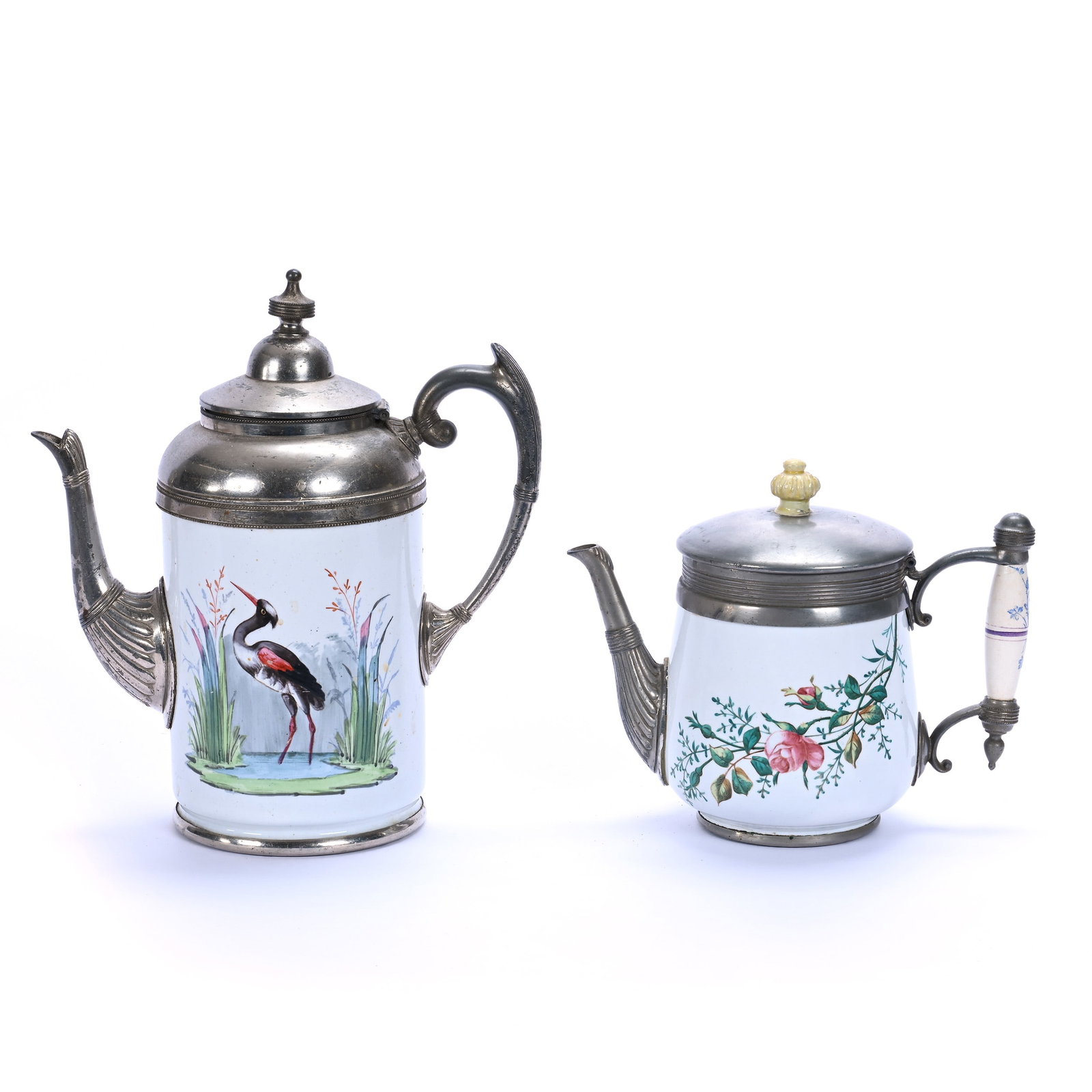 (2) Coffee Pots, Enamelware: (2) Coffee Pots, Enamelware, 10.75 x 9.75 x 5 Inches, 19th Century, Larger Pot Has Stork Decor, 7.25" Pot Has Floral Decor With Finial Repair, 4.8 Pounds, Grady and Annette Hite Collection, North