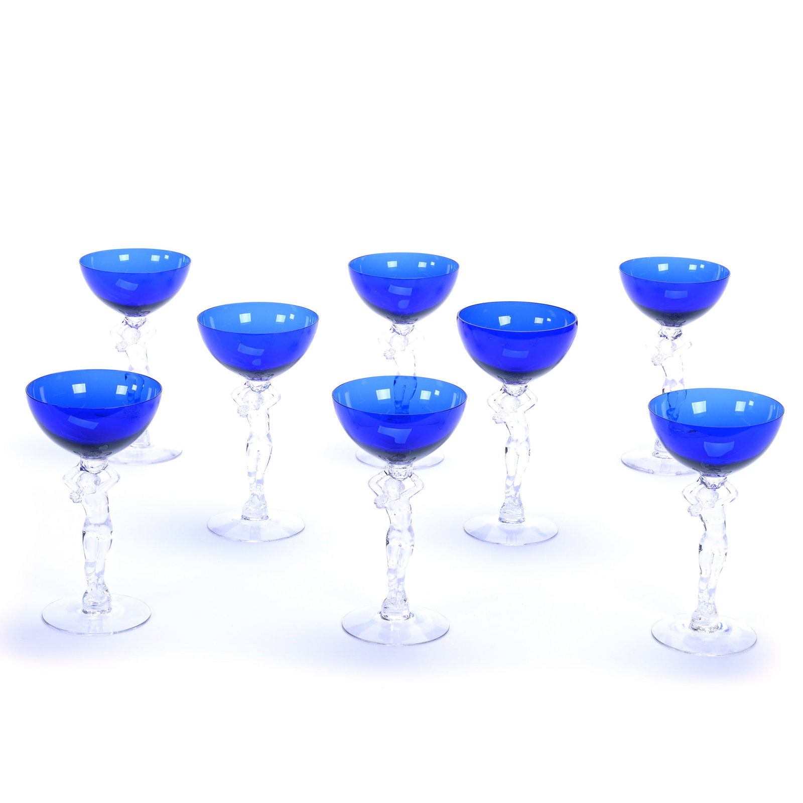 (8) Stems, Cambridge Statuesque Line: (8) Stems, Cambridge Statuesque Line, 7.25 x 4 x 4 Inches, Cobalt Blue Bowls With Clear Figural Nude Stems And Foot, There Is Some Height Variation, (4) Have Minor Rim Nicks, 3.6 Pounds, Grady and Ann