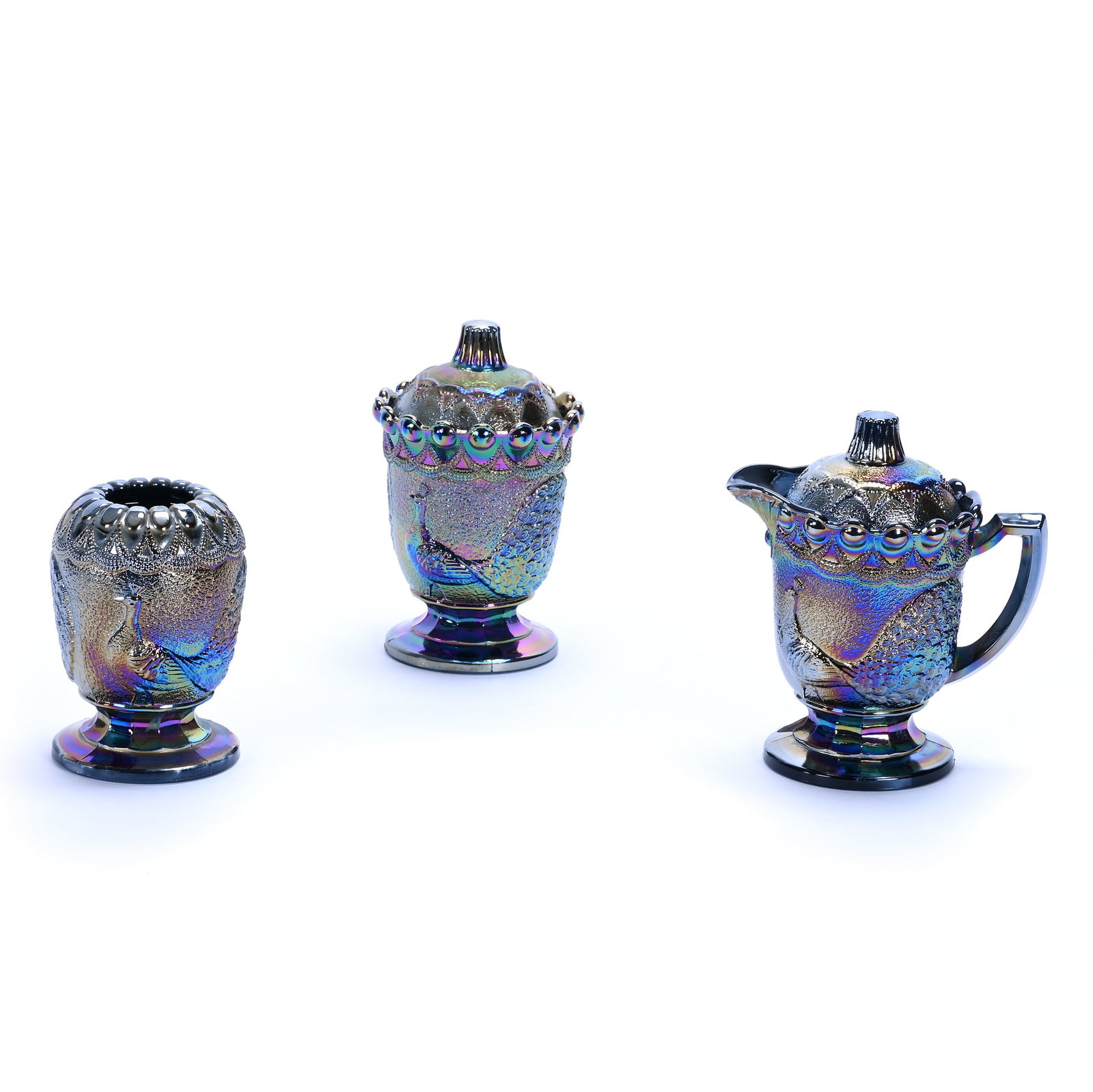 (3) Piece Table Set, Marked Westmoreland, Strutting Peacock Pattern: (3) Piece Table Set, Marked Westmoreland, Strutting Peacock Pattern, 5.5 x 3.5 x 3.5 Inches, Dated 1974, Amethyst, (1) Covered Creamer, (1) Covered Sugar, And (1) Rose Bowl, 2.7 Pounds, Private Collec