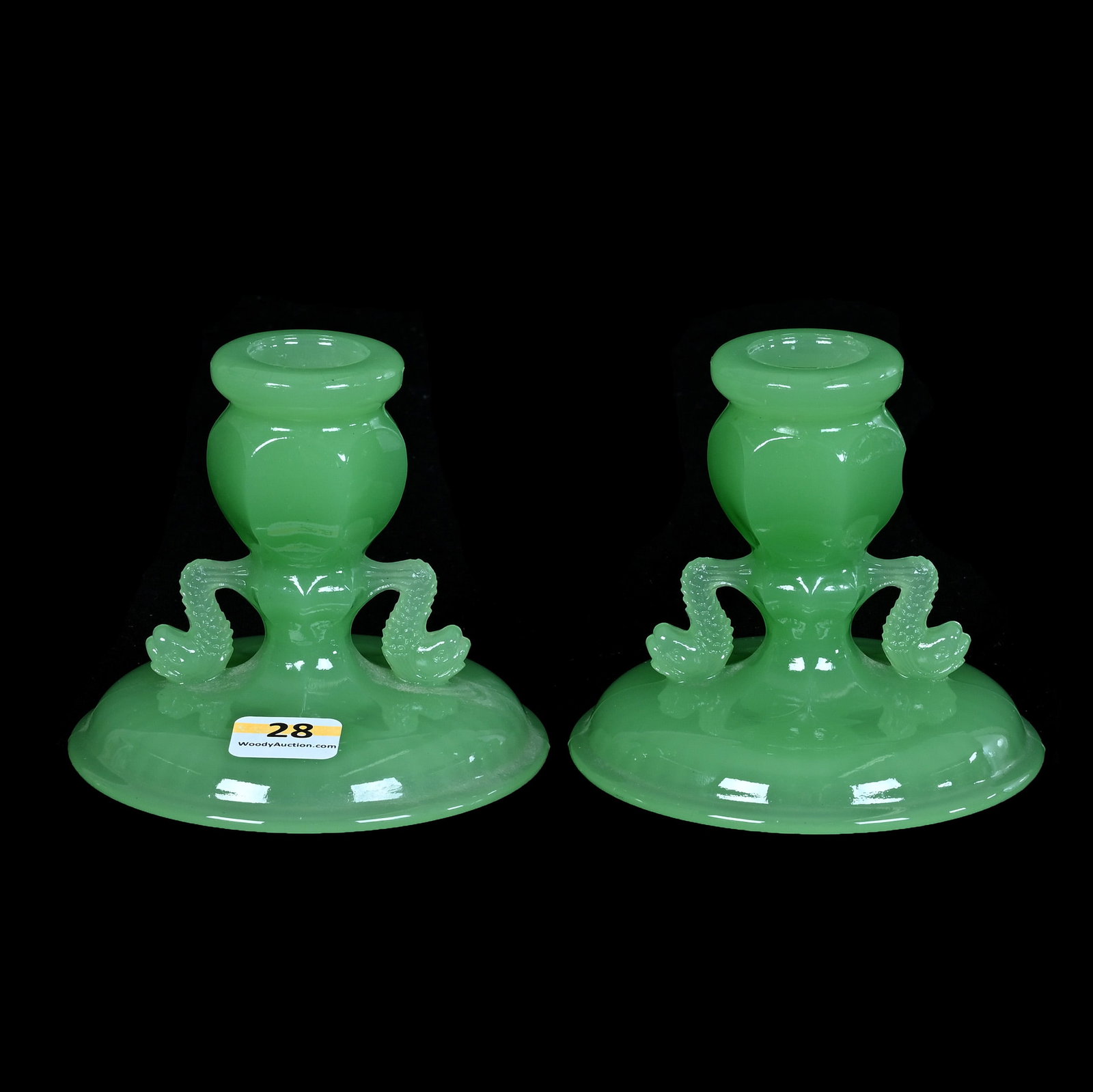 Pair Candlestick Holders, Fenton Green Jade Art Glass: Pair Candlestick Holders, Fenton Green Jade Art Glass, 3.5 x 4 x 4 Inches, Figural Dolphin Handles, Circa 1930s, 1 Pound, Private Collection, Missouri. Effective 6/6/26, All LiveAuctioneers Invoices M