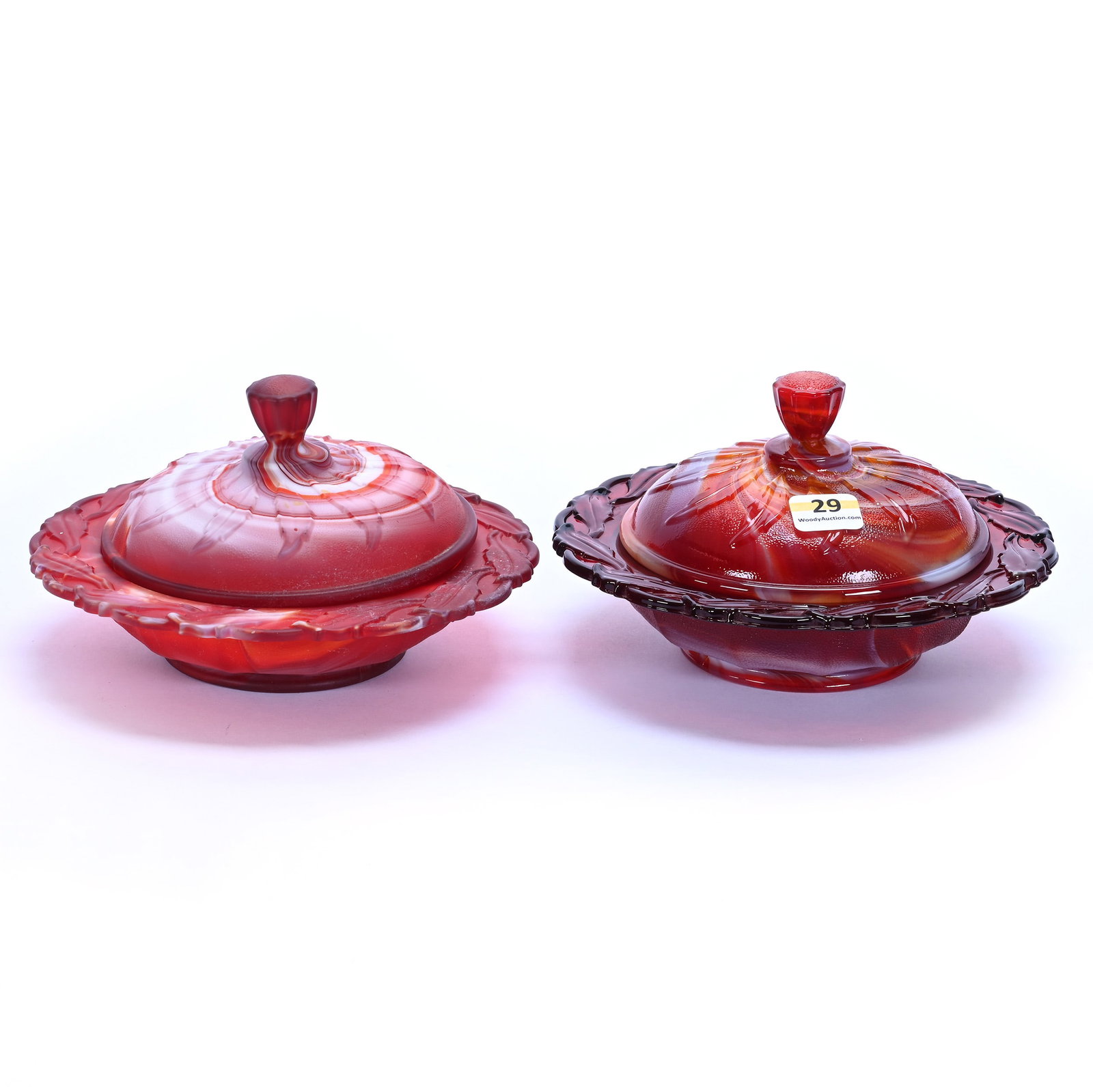 (2) Covered Butter Dishes, Red Slag Art Glass By Imperial: (2) Covered Butter Dishes, Red Slag Art Glass By Imperial, 6.5 x 6.5 x 3.75 Inches, (1) Satin And (1) Gloss, 2.5 Pounds, Private Collection, Missouri. Effective 6/6/26, All LiveAuctioneers Invoices Mu