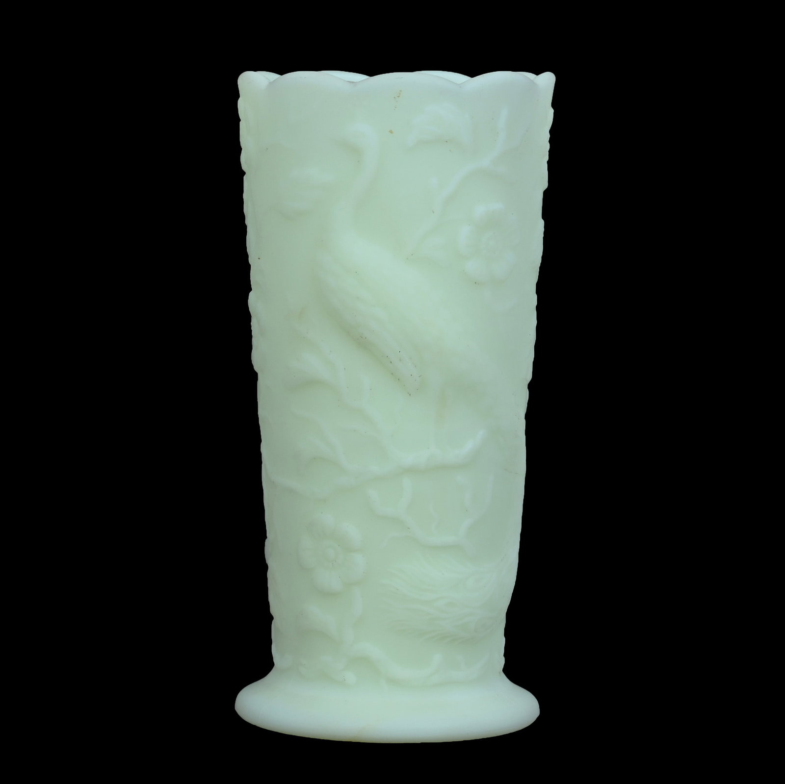 Vase, Fenton Art Glass, Peacock Pattern: Vase, Fenton Art Glass, Peacock Pattern, 7.75 x 3.75 x 3.75 Inches, Custard, Highly Reactive Under Blacklight, 2.3 Pounds, Private Collection, Missouri. Effective 6/6/26, All LiveAuctioneers Invoices 