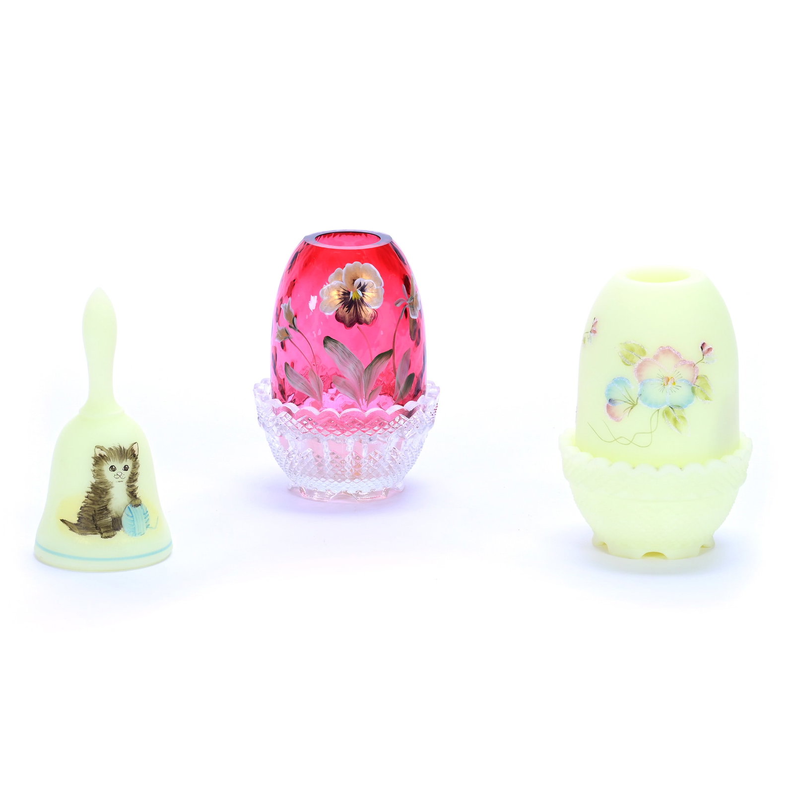 (2) Fairy Lamps And (1) Bell, Fenton Art Glass: (2) Fairy Lamps And (1) Bell, Fenton Art Glass, 4.5 x 3.25 x 3.25 Inches, Includes (1) Custard Fairy Lamp With Pansy Decor, (1) Cranberry Fairy Lamp With Clear Base, And (1) 4.5" Custard Bell With Kit