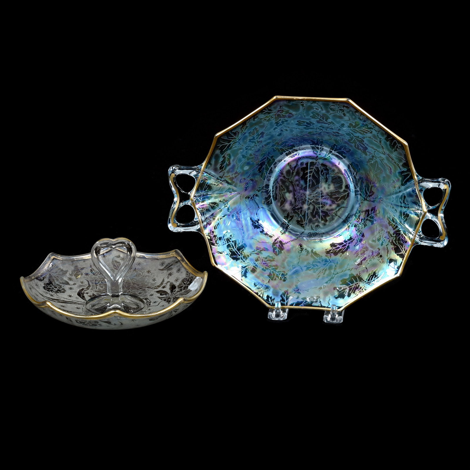 Two Handled Bowl And Candy Dish, Fostoria Brocaded Carnival Glass: Two Handled Bowl And Candy Dish, Fostoria Brocaded Carnival Glass, 11 x 8.5 x 2.5 Inches, (1) Iridescent Blue Acorn Pattern And (1) 7.5" Iridescent Clear Orchid Pattern With Heart Shaped Handle, 2.1 P