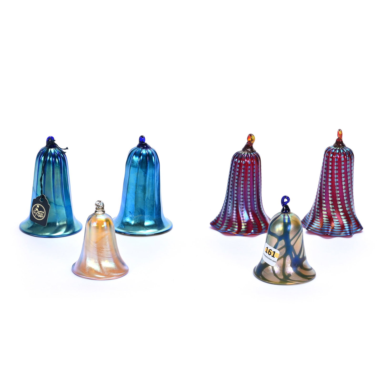 (6) Bell Shaped Ornaments, Attributed To Lundberg Studios: (6) Bell Shaped Ornaments, Attributed To Lundberg Studios, 4.5 x 2.5 x 2.5 Inches, (2) Red With Silver Iridescence, (2) Blue Iridescent, (1) 3.25" Gold Iridescent With Blue Vine, And (1) 3" Gold Iride