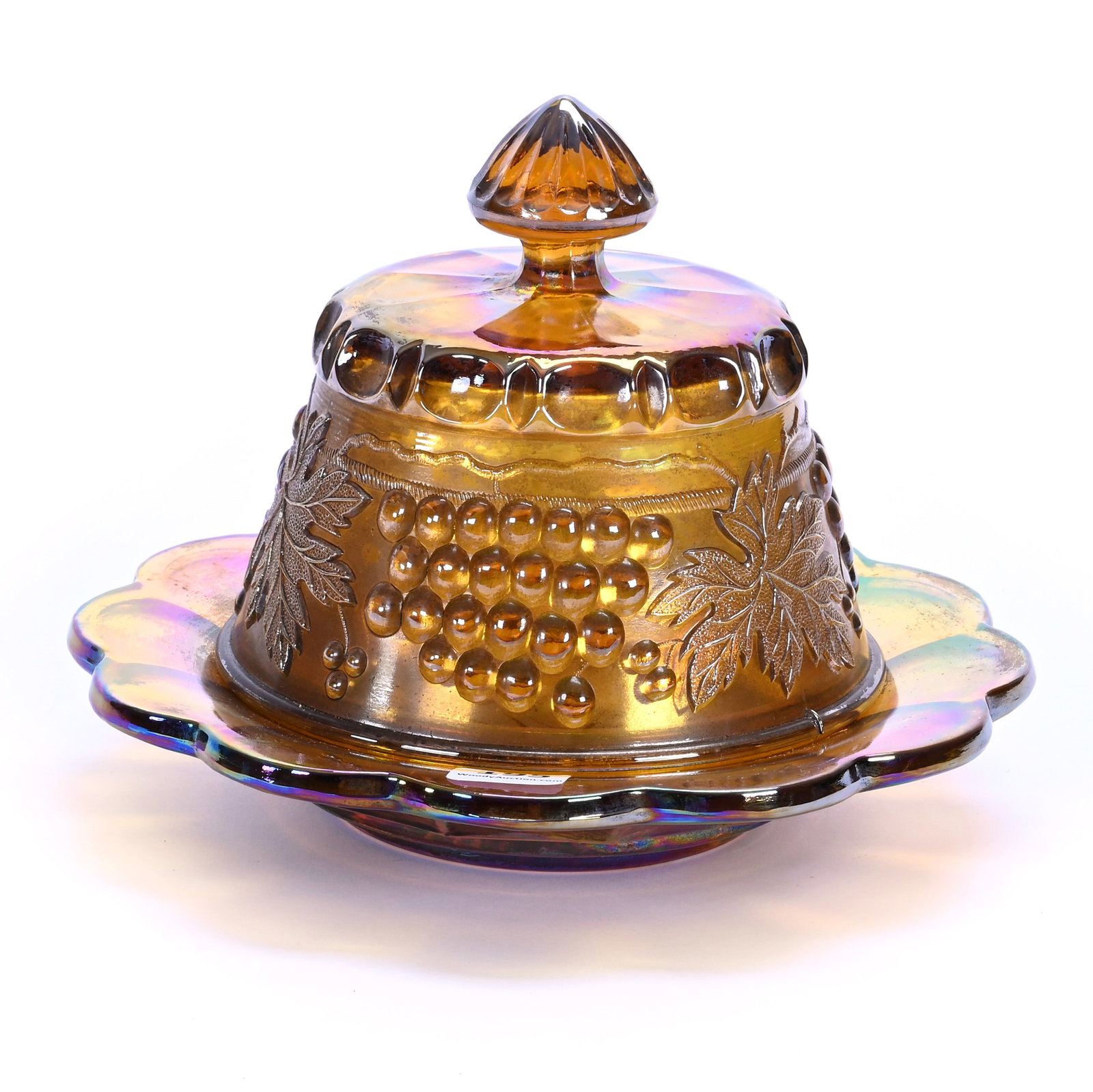 Covered Butter Dish, Amber Carnival Glass: Covered Butter Dish, Amber Carnival Glass, 6 x 7.75 x 7.75 Inches, Grape And Cable Pattern By Northwood, 2.8 Pounds, Hazel Elaine Carlson Estate, Illinois. Effective 6/6/26, All LiveAuctioneers