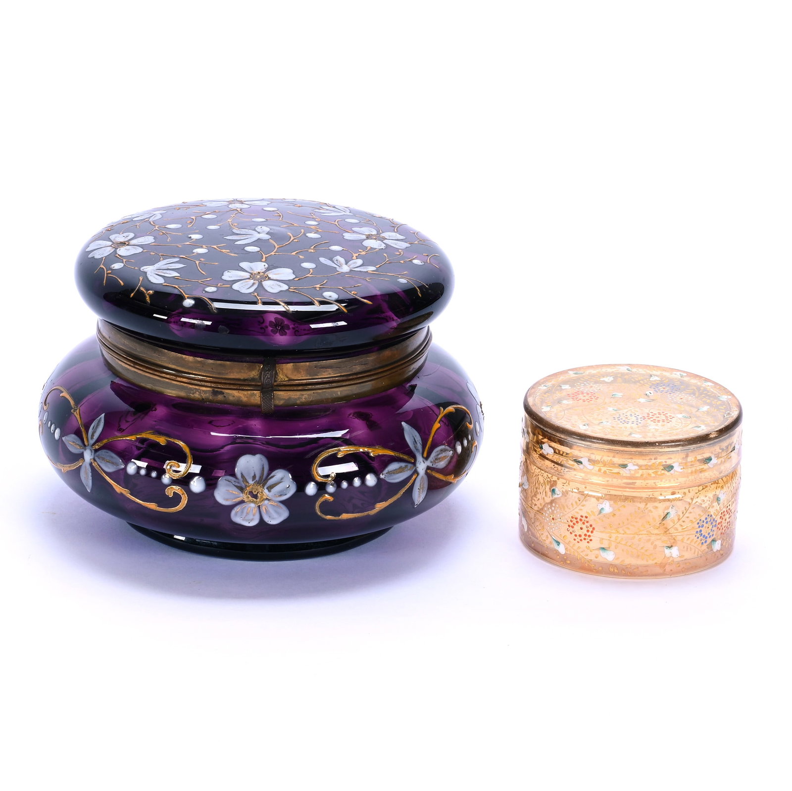 (2) Vanity Boxes, Bohemian Art Glass: (2) Vanity Boxes, Bohemian Art Glass, 5.5 x 5.5 x 3.75 Inches, (1) Amethyst With Enamel Floral Decor And (1) 3" Diameter With Iridescent Marigold And Enamel Floral Decor, 1.4 Pounds, Hazel Elaine Carl