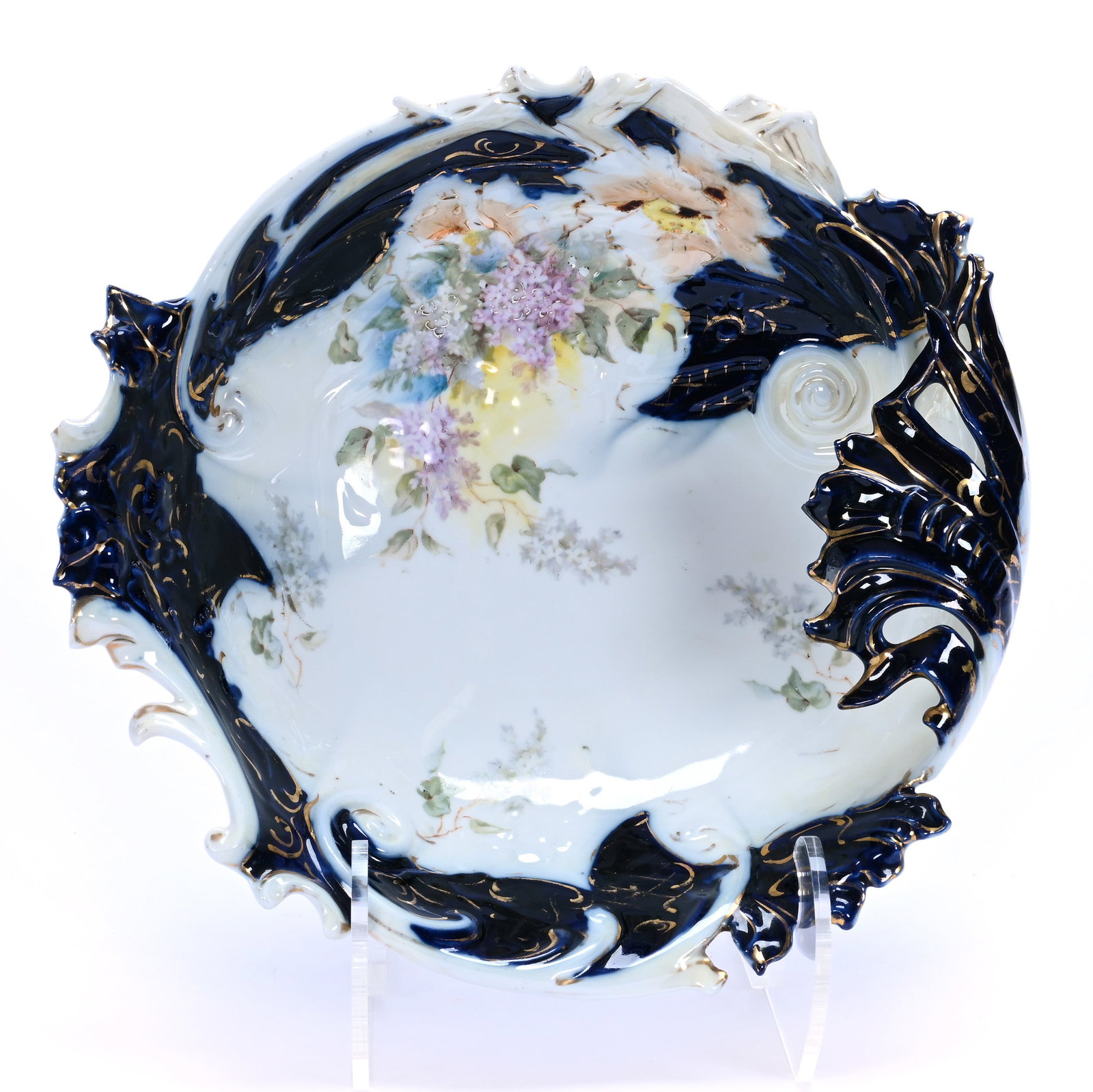 Foldover Bowl, Unmarked R.S. Prussia: Foldover Bowl, Unmarked R.S. Prussia, 11 x 10.5 x 3.75 Inches, White And Cobalt Blue With Floral Decor, Has Rim Chips, 1.8 Pounds, Hazel Elaine Carlson Estate, Illinois. Effective 6/6/26, All LiveAuct