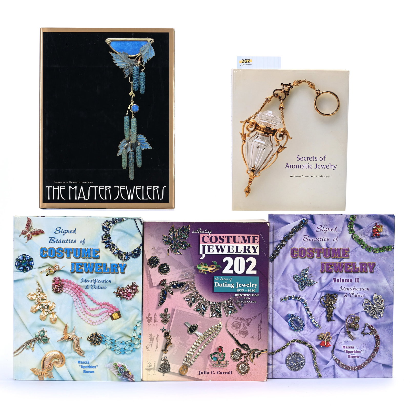 (5) Books About Jewelry: (5) Books About Jewelry, 12.5 x 9.25 x 4.5 Inches, Includes (1) Secrets Of Aromatic Jewelry By Annette Green And Linda Dyett, (1) Signed Beauties Of Costume Jewelry By Marcia "Sparkles" Brown, (1) The