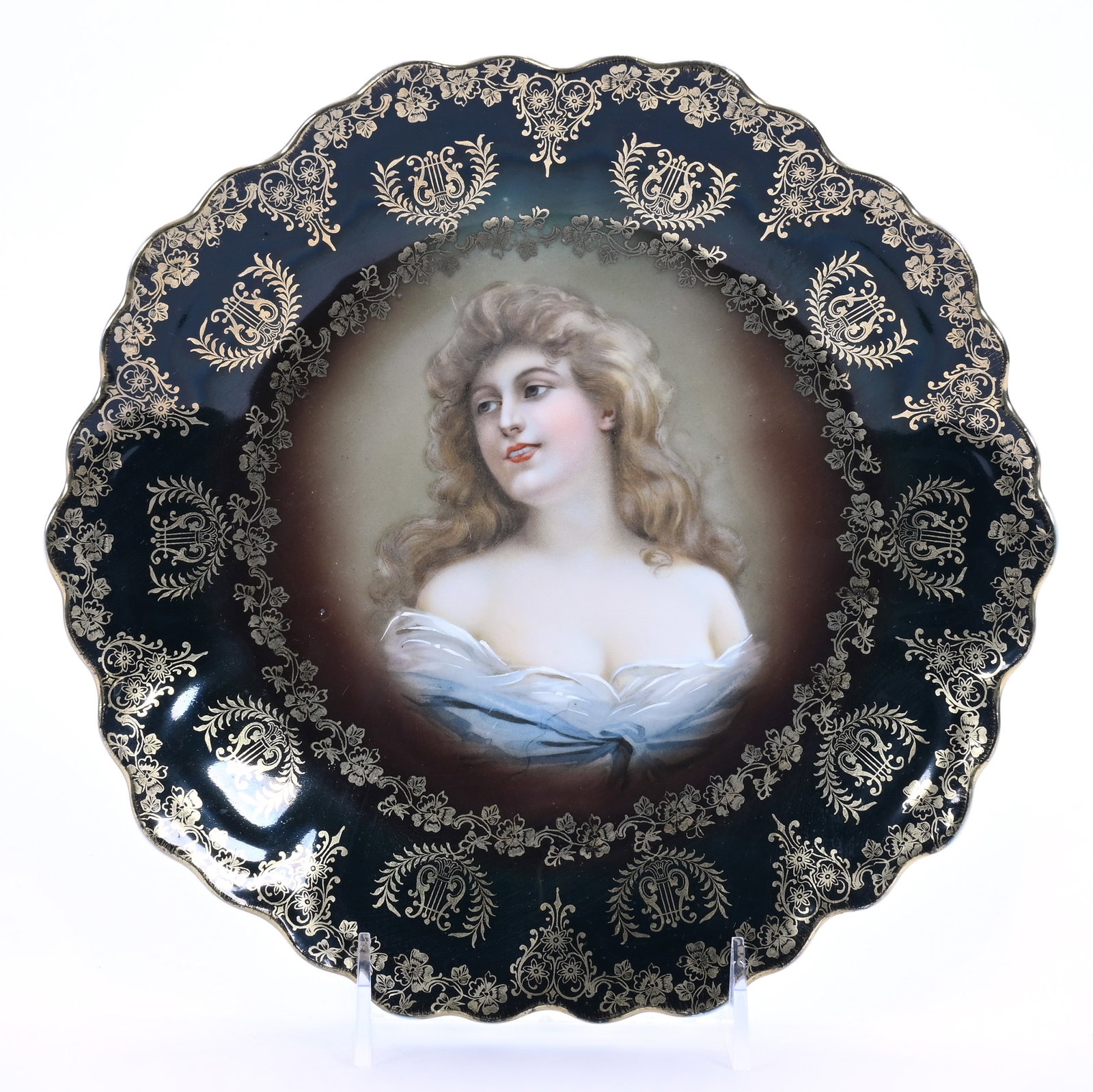 Plate, Marked Bavaria: Plate, Marked Bavaria, 9.75 x 9.75 x 1.25 Inches, Portrait Of Young Women On Brown Background With Black Border And Heavy Gold Stencil Highlights, 1 Pound, Private Collection, Nevada. Effective 6/6/26
