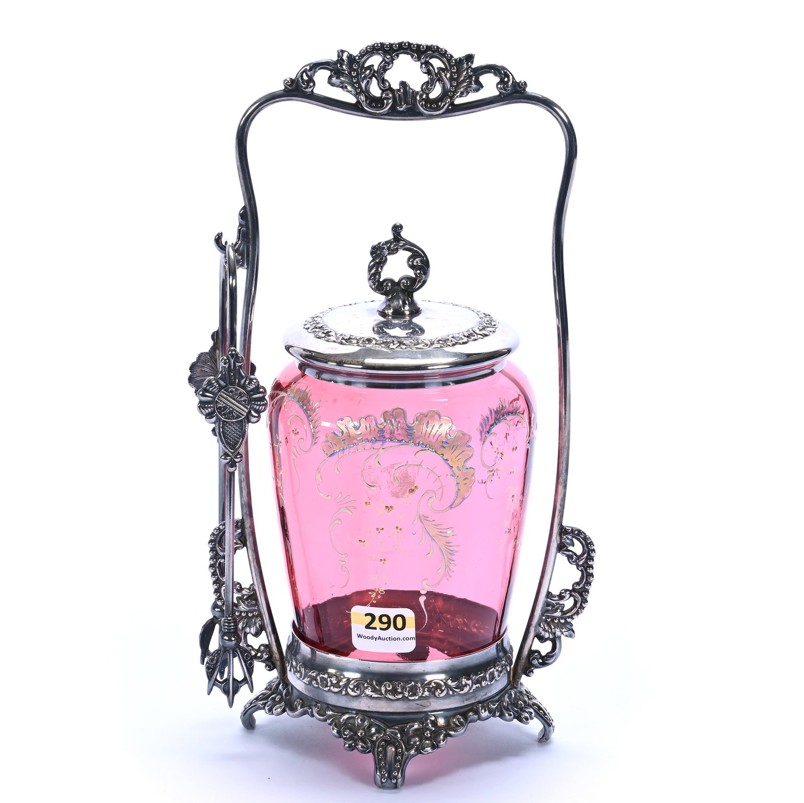 Victorian Pickle Castor, Cranberry Art Glass Insert: Victorian Pickle Castor, Cranberry Art Glass Insert, 10 x 4.25 x 4.25 Inches, Set On Pairpoint #699 Silverplate Frame, 1.4 Pounds, Private Collection, Kansas. Effective 6/6/26, All LiveAuctioneers Inv