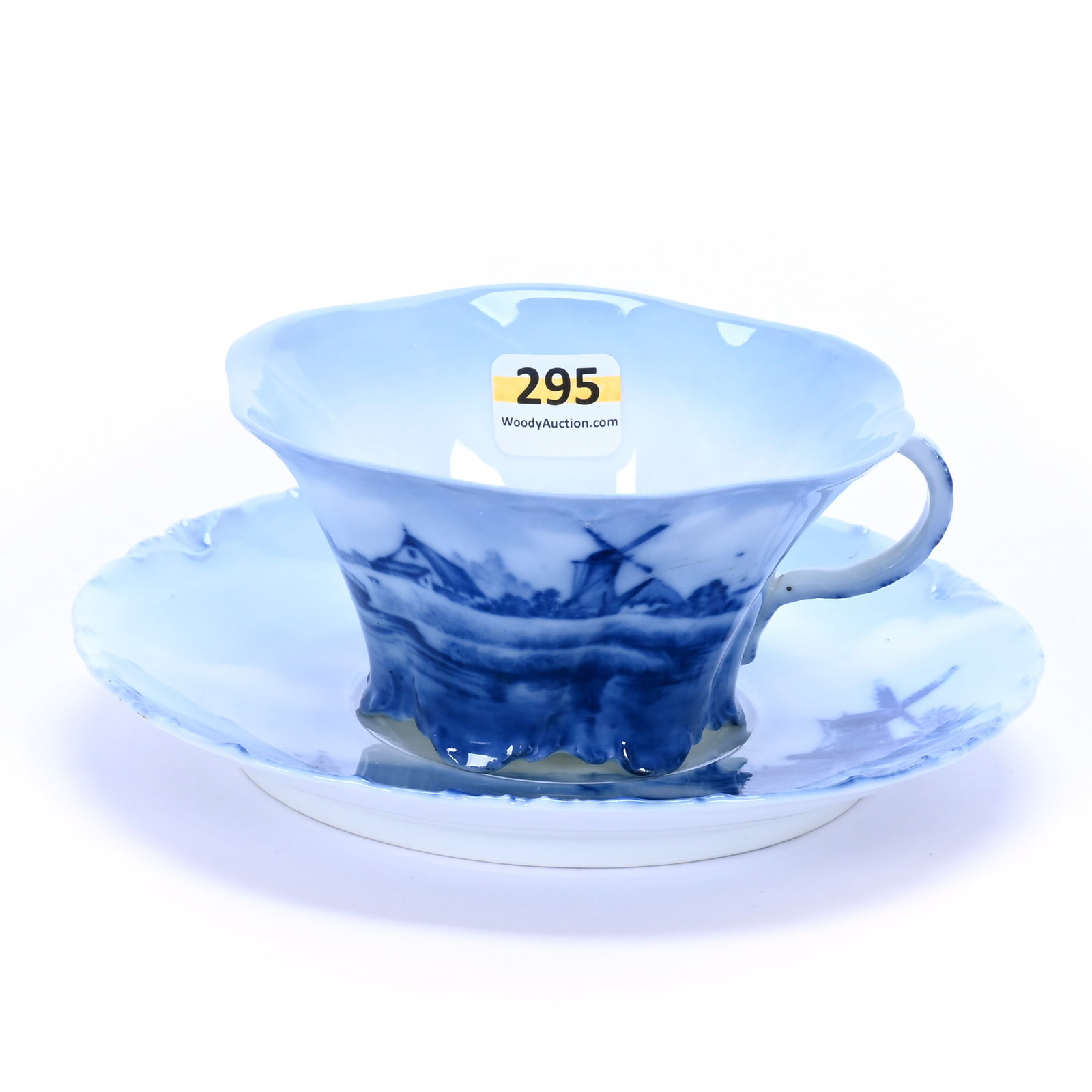 Coffee Cup And Saucer, Marked Delft Germany: Coffee Cup And Saucer, Marked Delft Germany, 2.5 x 6.25 x 6.25 Inches, Features Classic Windmill Scenic Decor, 0.5 Pounds, Private Collection, Kansas. Effective 6/6/26, All LiveAuctioneers Invoices Mu