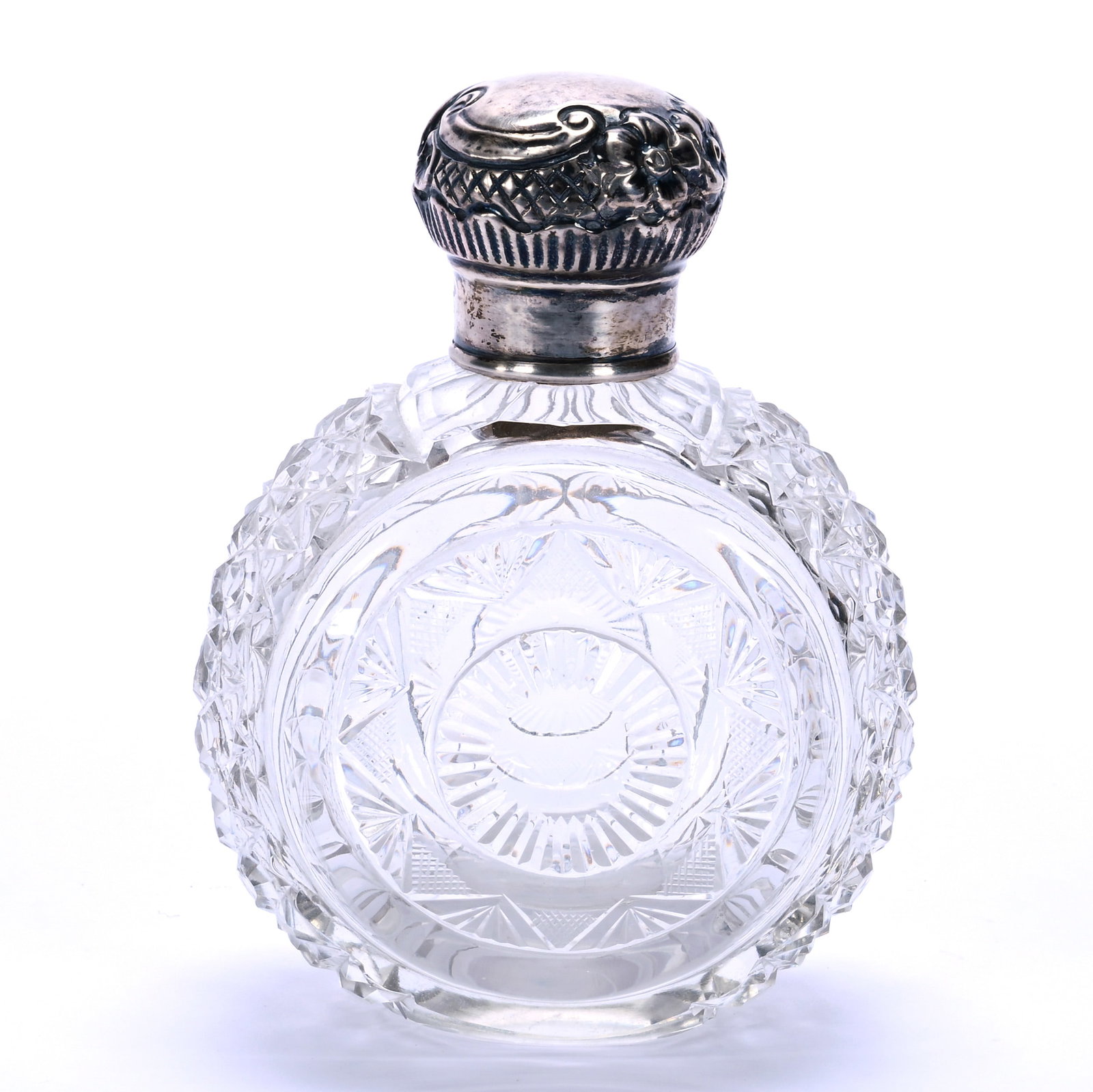 Cologne Bottle, Brilliant Period Cut Glass: Cologne Bottle, Brilliant Period Cut Glass, 5.25 x 4 x 2.75 Inches, Ovoid Shape With Circular Design Cuttings And Russian Pattern Highlights, Glass Stopper And Sterling Top, 0.9 Pounds, Grady and Anne