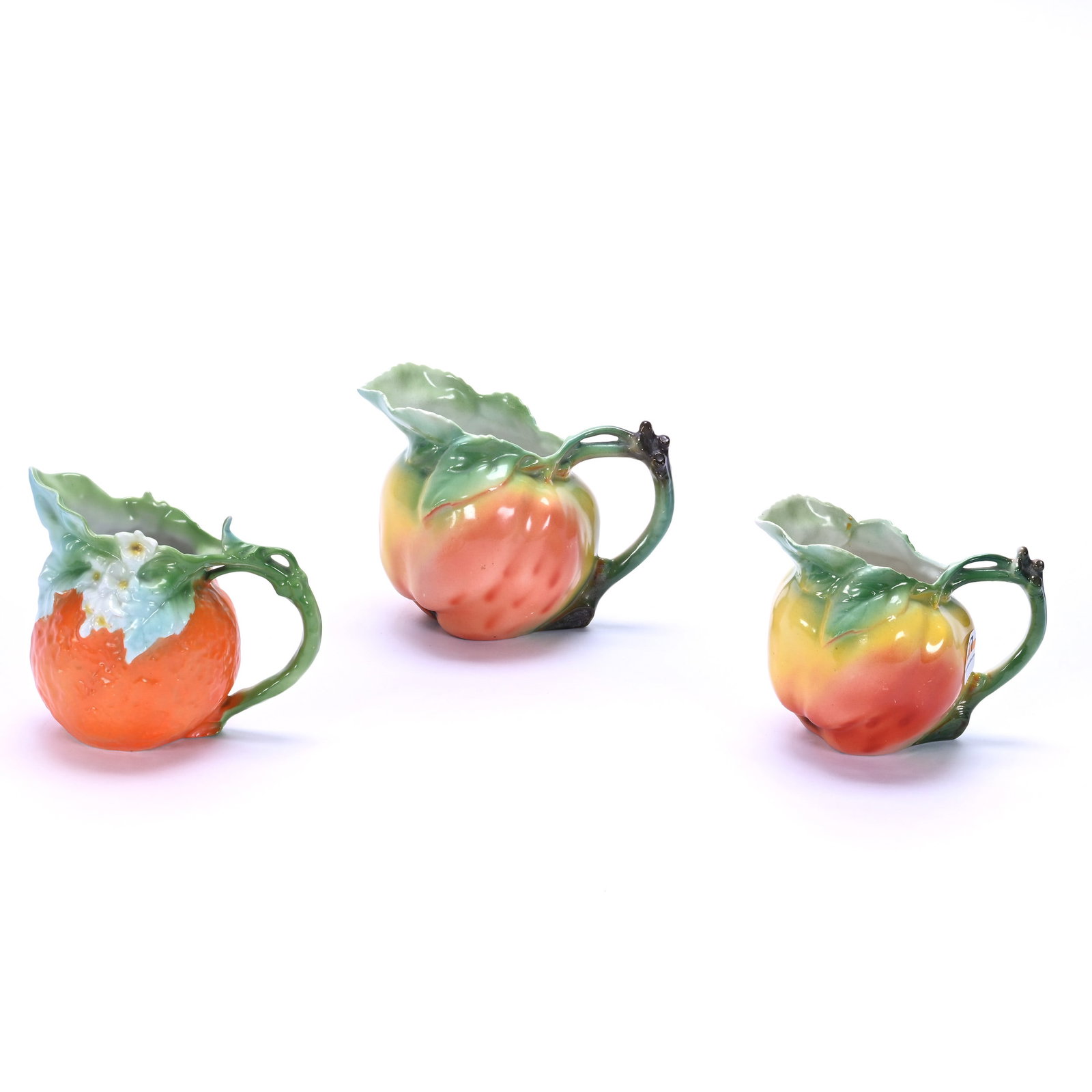 (3) Fruit Shaped Milk Pitcher And Creamers, Royal Bayreuth Blue Mark: (3) Fruit Shaped Milk Pitcher And Creamers, Royal Bayreuth Blue Mark, 4 x 5.5 x 4 Inches, (1) Apple Milk Pitcher, (1) 3.75" Apple Creamer, (1) 4.5" Orange Creamer, 1.2 Pounds, Private Collection, Mich