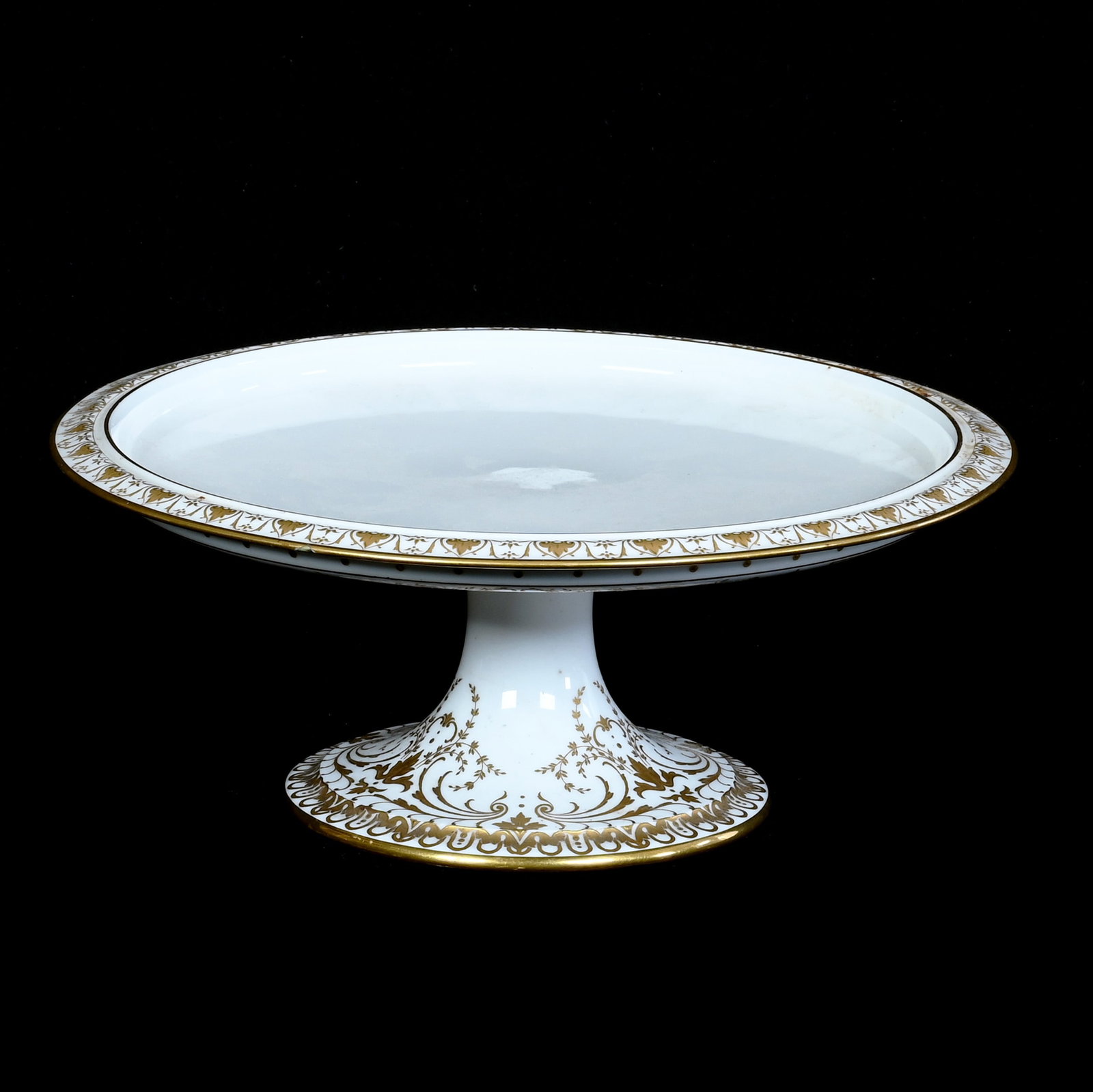 Cake Stand, French Sevres: Cake Stand, French Sevres, 4.5 x 10.75 x 10.75 Inches, Circa 1863, White With Elaborate Gold Gilding, Glaze Chip Repair Bottom Side Of Rim, 2.4 Pounds, Private Collection, Michigan. Effective 6/6/26, 