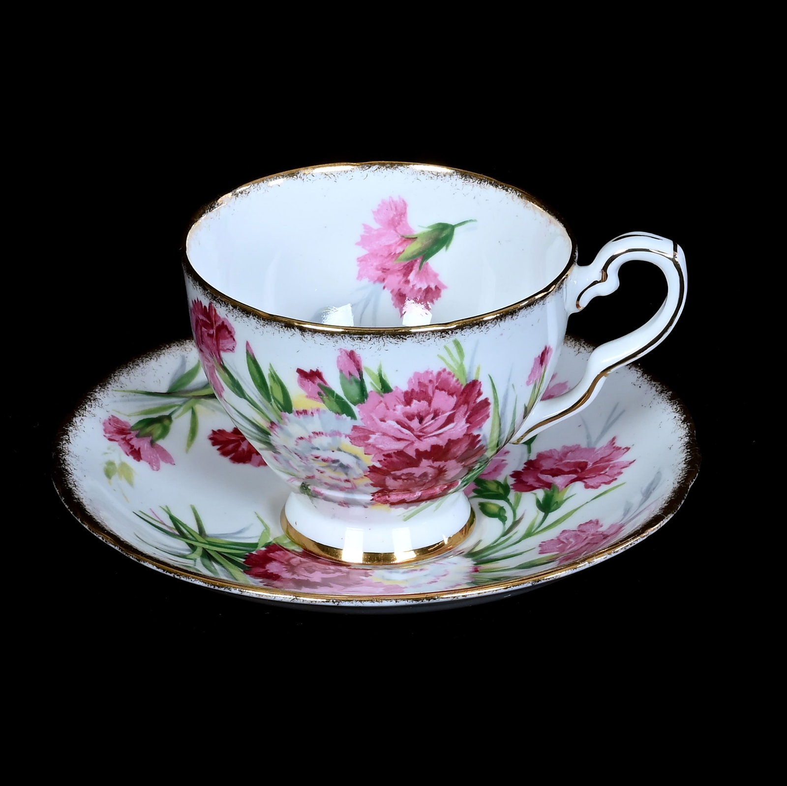Cup And Saucer, Marked Royal Stafford Bone China: Cup And Saucer, Marked Royal Stafford Bone China, 3 x 5.5 x 5.5 Inches, Carnation Pattern, 0.5 Pounds, Private Collection, Michigan. Effective 6/6/26, All LiveAuctioneers Invoices Must Be Paid Using T