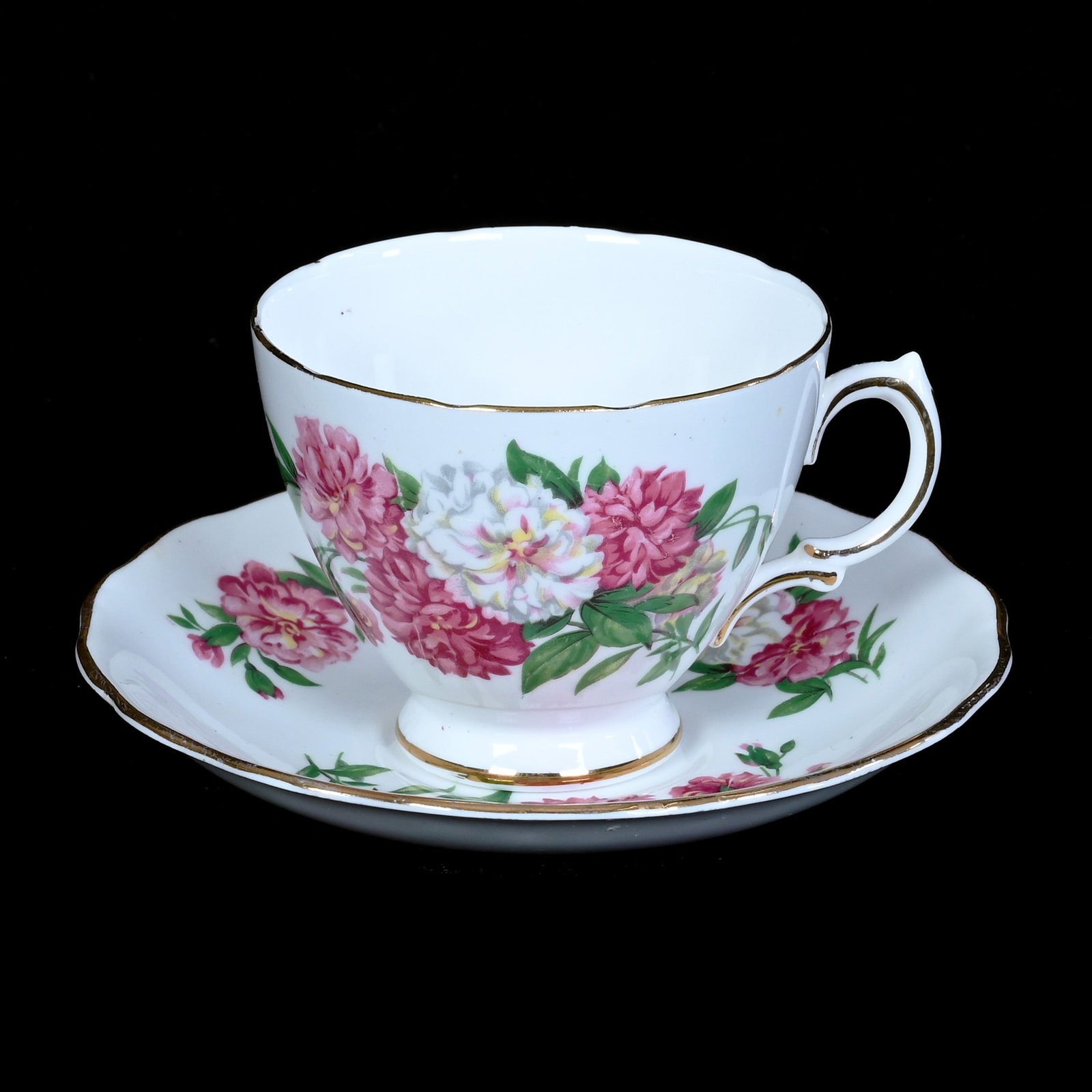 Cup And Saucer, Marked Royal Vale Bone China: Cup And Saucer, Marked Royal Vale Bone China, 2.75 x 5.5 x 5.5 Inches, White With Pink And White Floral Decor, 0.5 Pounds, Private Collection, Michigan. Effective 6/6/26, All LiveAuctioneers Invoices 