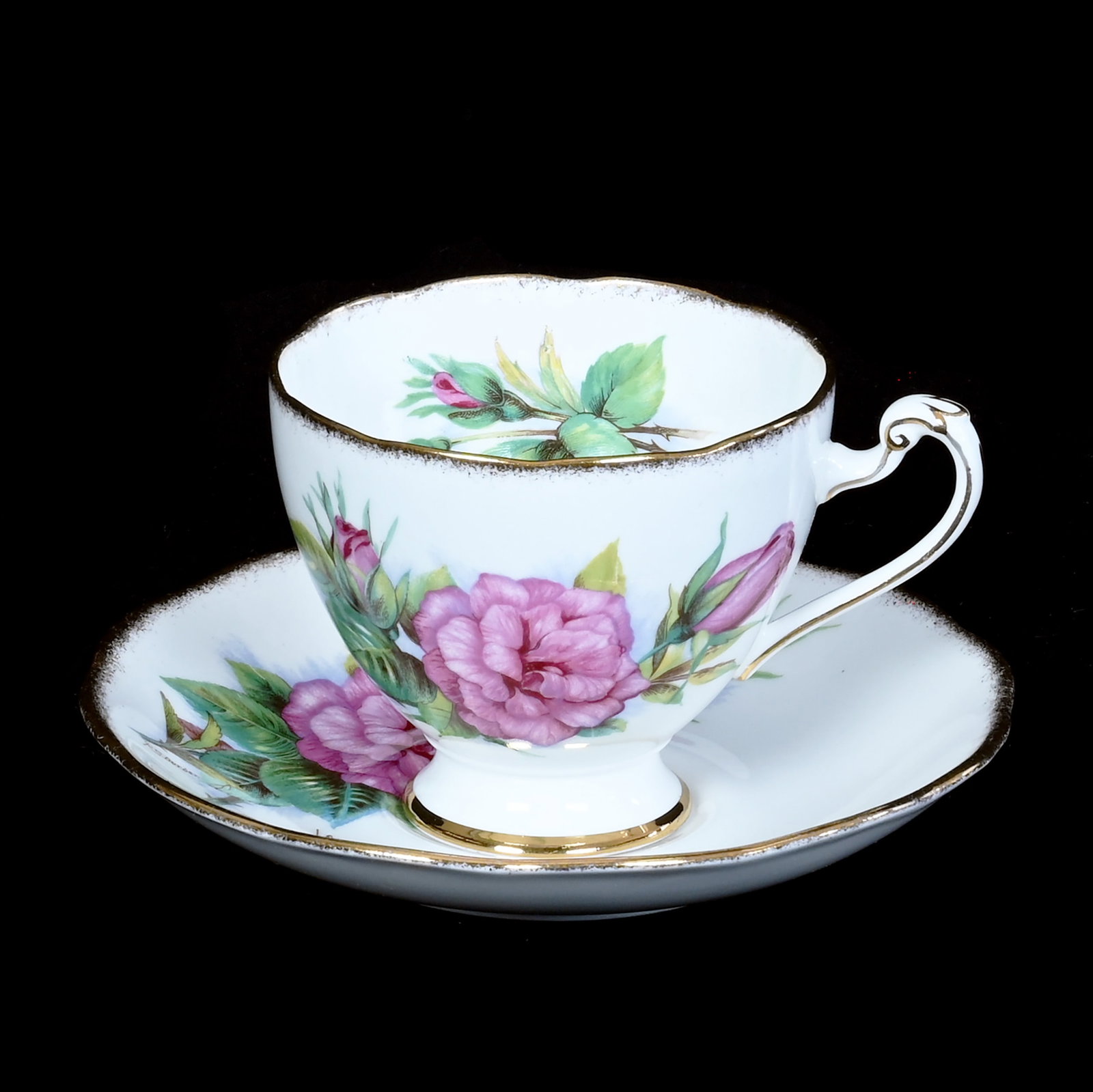 Cup And Saucer, Marked Roslyn Bone China: Cup And Saucer, Marked Roslyn Bone China, 3 x 5.75 x 5.75 Inches, Wheatcroft Roses No. 5 Prelude Pattern, 0.6 Pounds, Private Collection, Michigan. Effective 6/6/26, All LiveAuctioneers Invoices Must 
