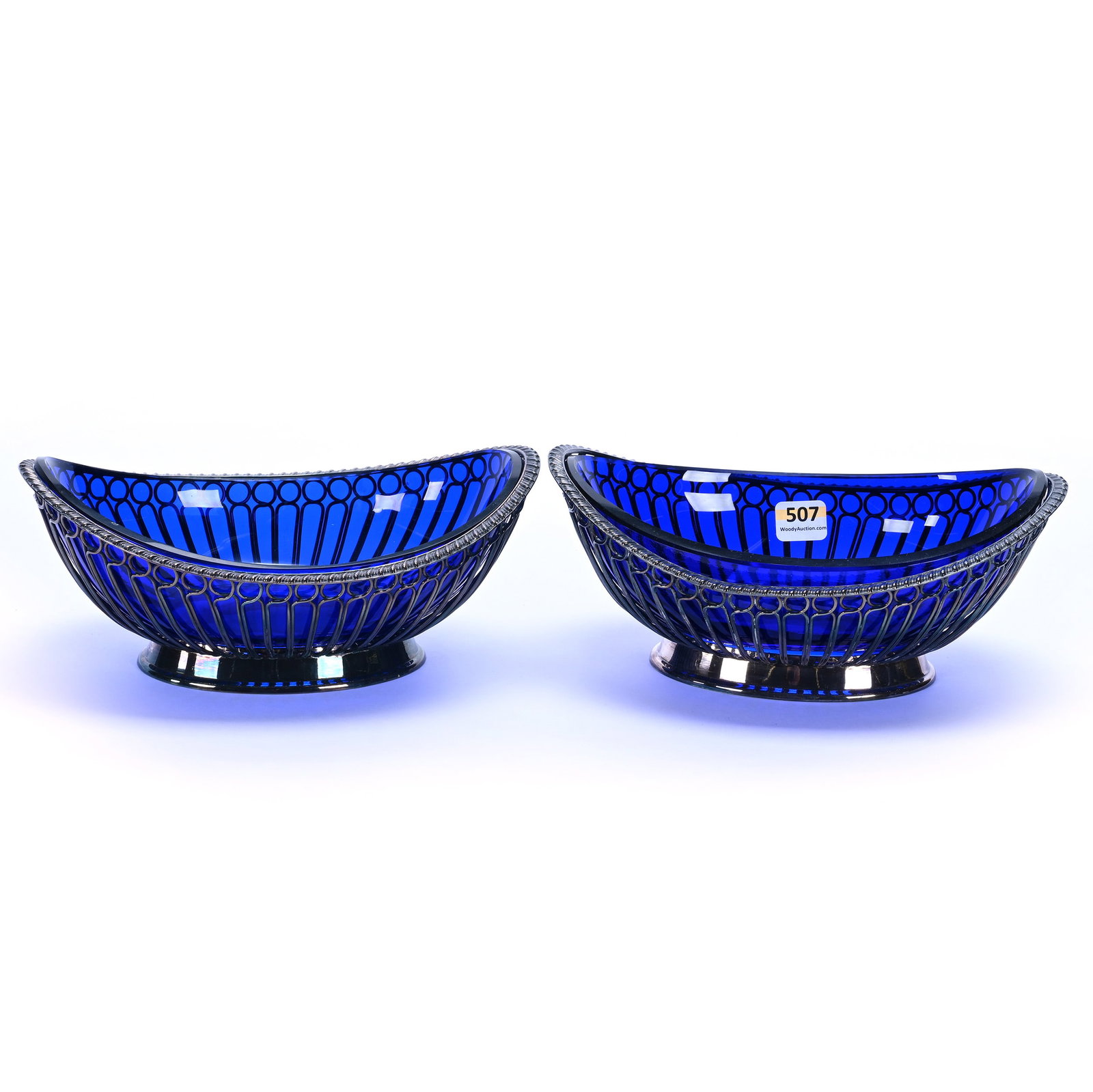 Pair Of Oval Bowls, By Barker Ellis: Pair Of Oval Bowls, By Barker Ellis, 8.5 x 5.75 x 3.5 Inches, Silver Plate Is Marked With Both England And Jewish Menorah, Unmarked Blue Oval Glass Inserts , 3.5 Pounds, Private Collection, Michigan. 