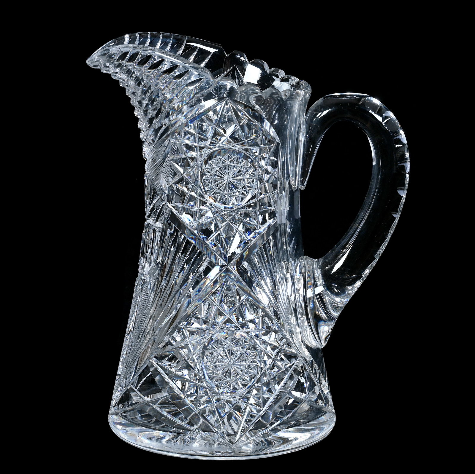 Water Pitcher, American Brilliant Cut Glass: Water Pitcher, American Brilliant Cut Glass, 9.25 x 7.5 x 5.25 Inches, Hobstar, Strawberry Diamond, Star, And Fan Motif, Ray Cut Base, Double Notched Handle, Step Cut Spout, 4.8 Pounds, Private Collec
