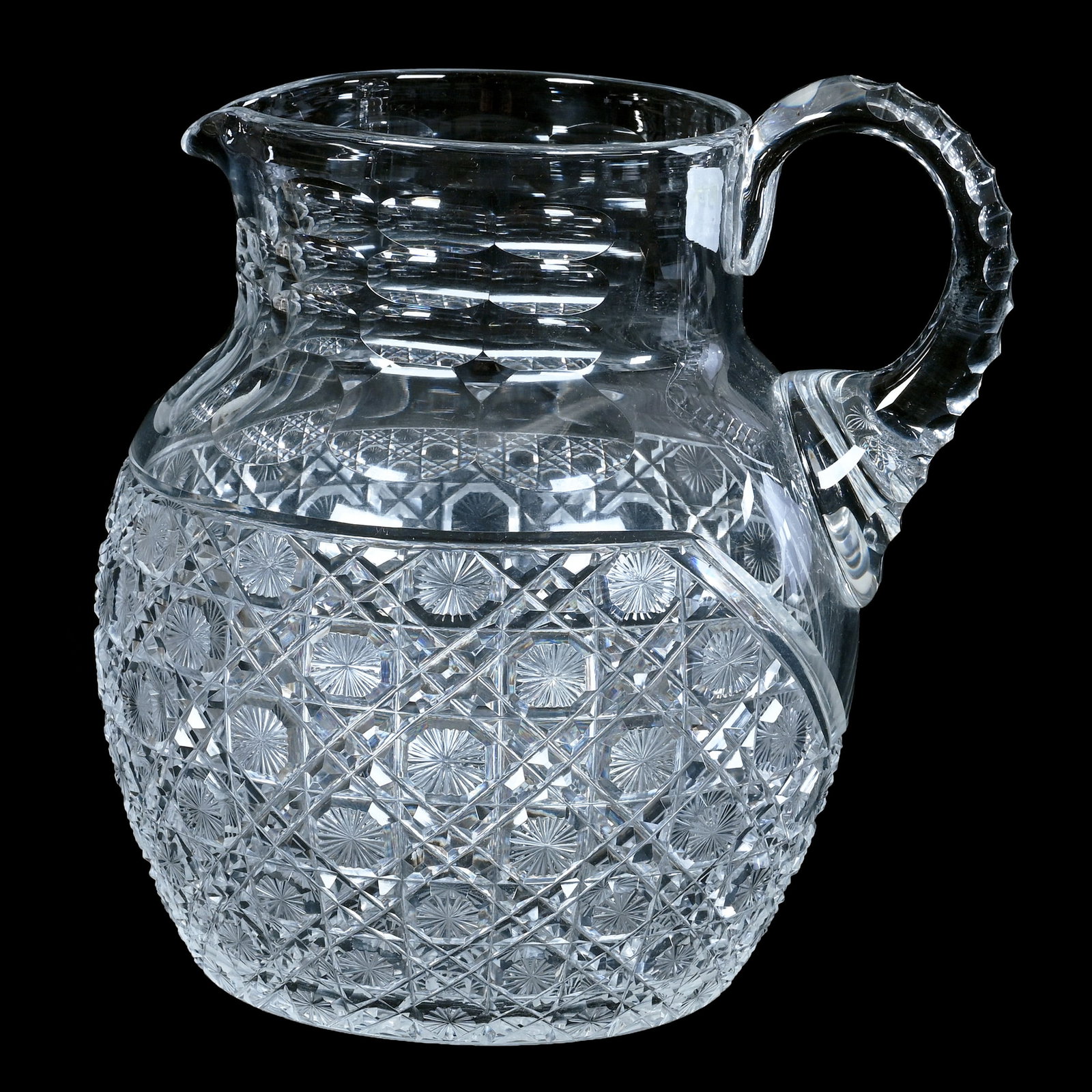 Pitcher, Brilliant Period Cut Glass: Pitcher, Brilliant Period Cut Glass, 7.5 x 6.75 x 6 Inches, Cane Pattern With Star Cut Buttons, Triple Notched Handle, Ray Cut Base, 2.5 Pounds, Private Collection, New Jersey. Effective 6/6/26, All L
