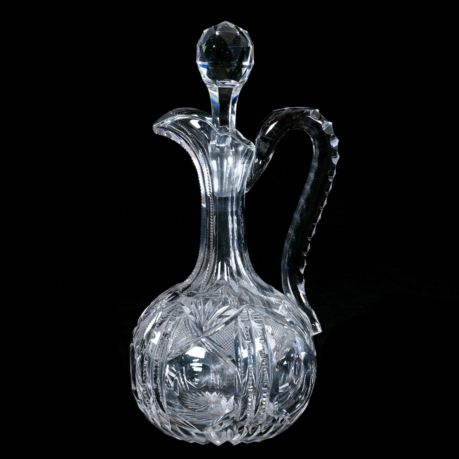 Decanter, American Brilliant Cut Glass: Decanter, American Brilliant Cut Glass, 12 x 5.25 x 5.25 Inches, Alternating Panels Of Bullseye, Crosscutting, Prism, And Fan Motif, Triple Notched Handle, Ray Cut Base, Stopper Is A Possible Replacem