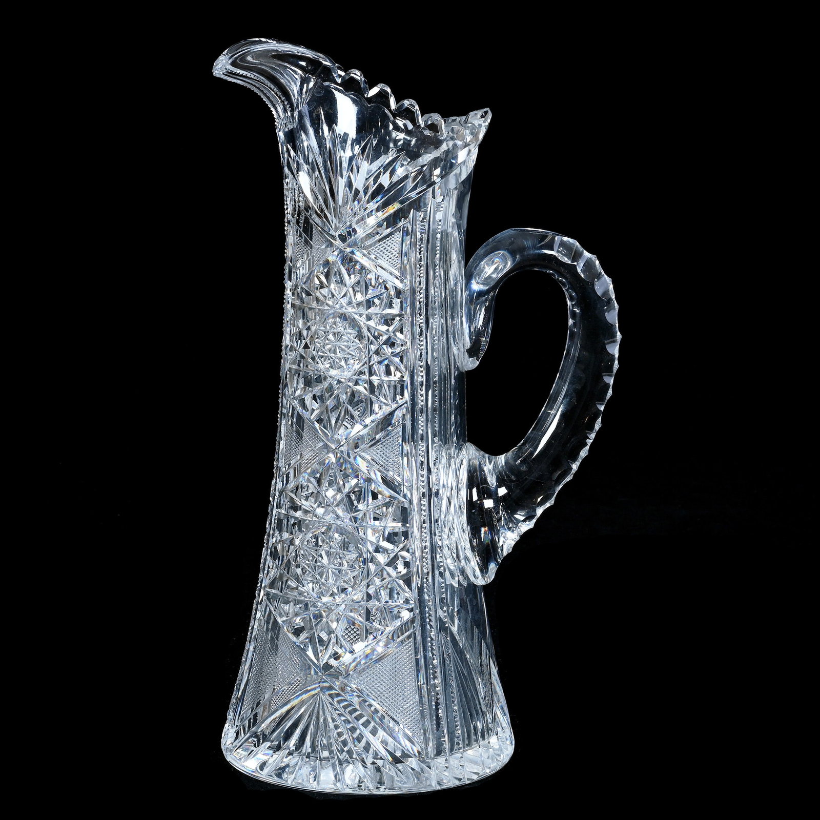 Tankard, American Brilliant Cut Glass: Tankard, American Brilliant Cut Glass, 12.25 x 7 x 5 Inches, Hobstar, Crosscutting, Prism, And Fan Motif, Triple Notched Handle, Ray Cut Base, Annealing Flaw On Body Near Handle, 4.6 Pounds, Mitchell 