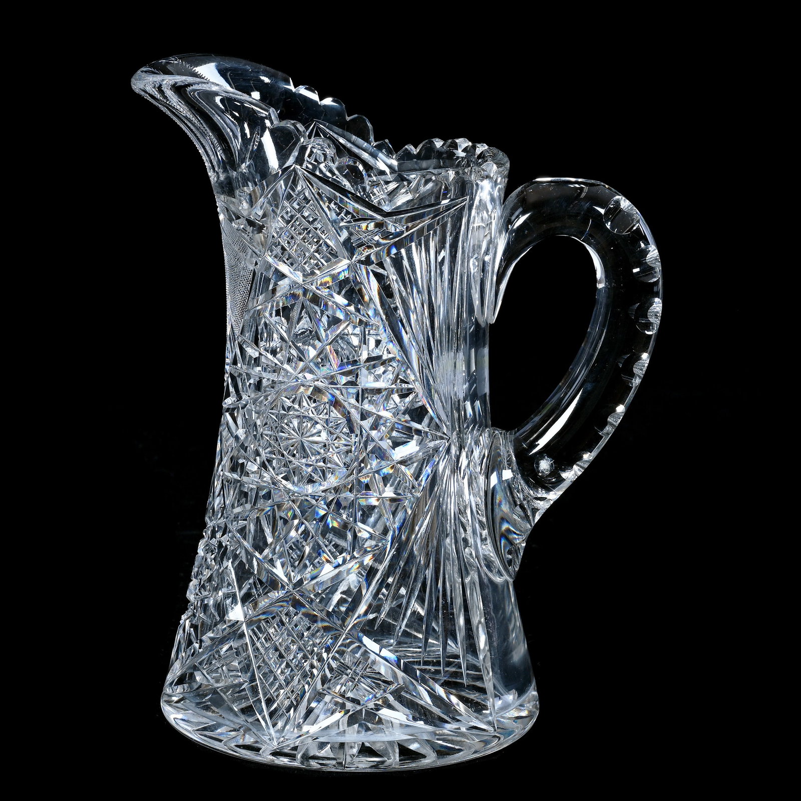 Water Pitcher, American Brilliant Cut Glass: Water Pitcher, American Brilliant Cut Glass, 9.25 x 7.25 x 5.25 Inches, Hobstar, Crosscutting, Quarter Diamond, And Fan Motif, Double Notched Handle, Ray Cut Base, Surface Blemish On Side Of Handle, 4