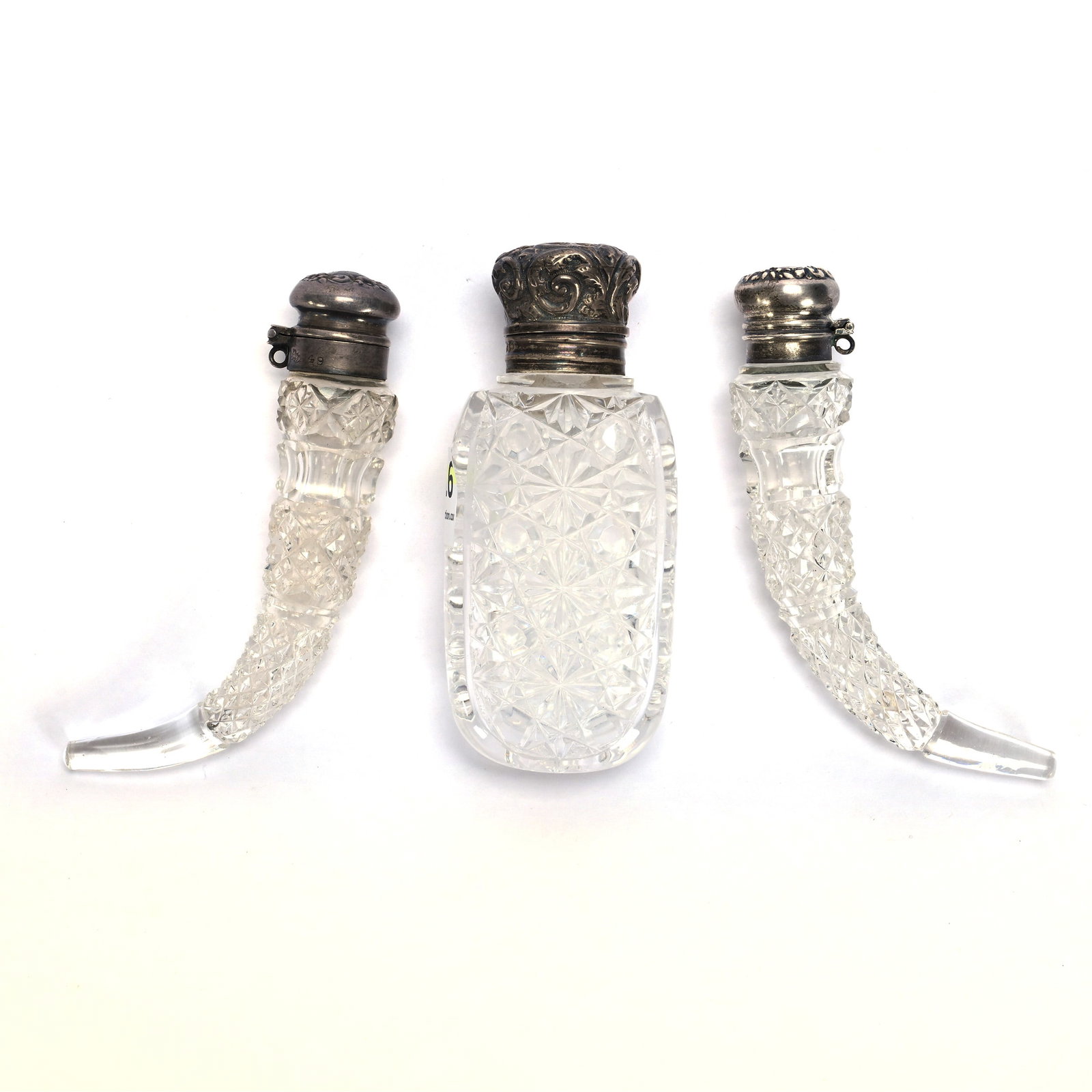 (3) Perfume Bottles, American Brilliant Cut Glass: (3) Perfume Bottles, American Brilliant Cut Glass, 3.75 x 1.5 x 1 Inches, (1) Russian Pattern With Sterling Flip Lid And No Stopper, Interior Is Cloudy, (2) Horn Shaped With Sterling Flip Lids, Both W