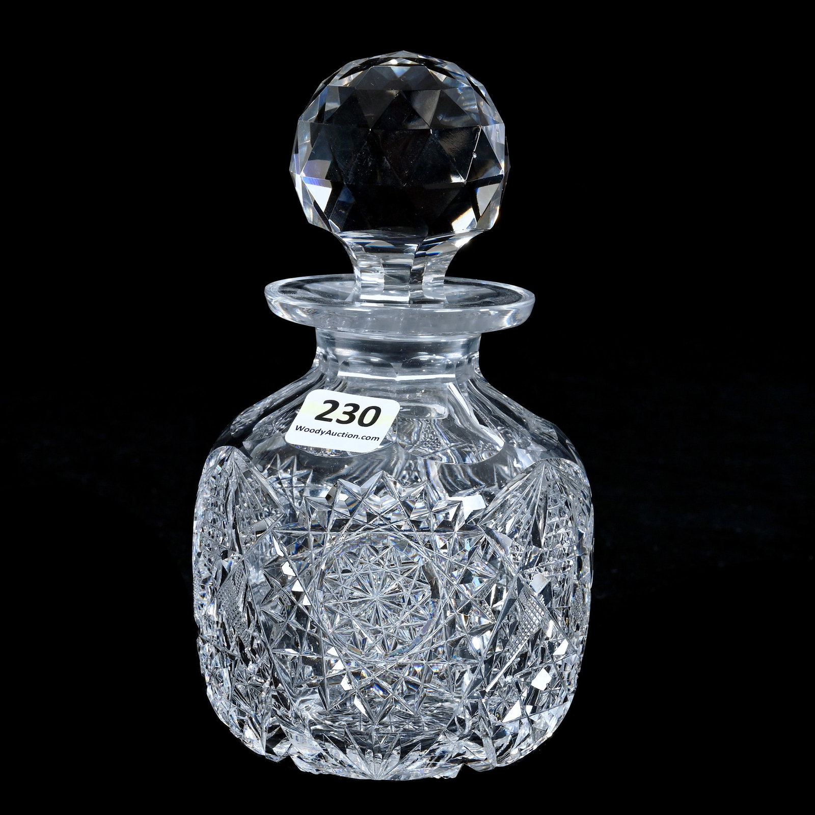 Cologne Bottle, American Brilliant Cut Glass: Cologne Bottle, American Brilliant Cut Glass, 6 x 3.5 x 3.5 Inches, Hobstar, Nailhead Diamond, Crosscutting, And Fan Motif, Hobstar Base, 1.8 Pounds, Mitchell Caughman Collection, Colorado. Effective 