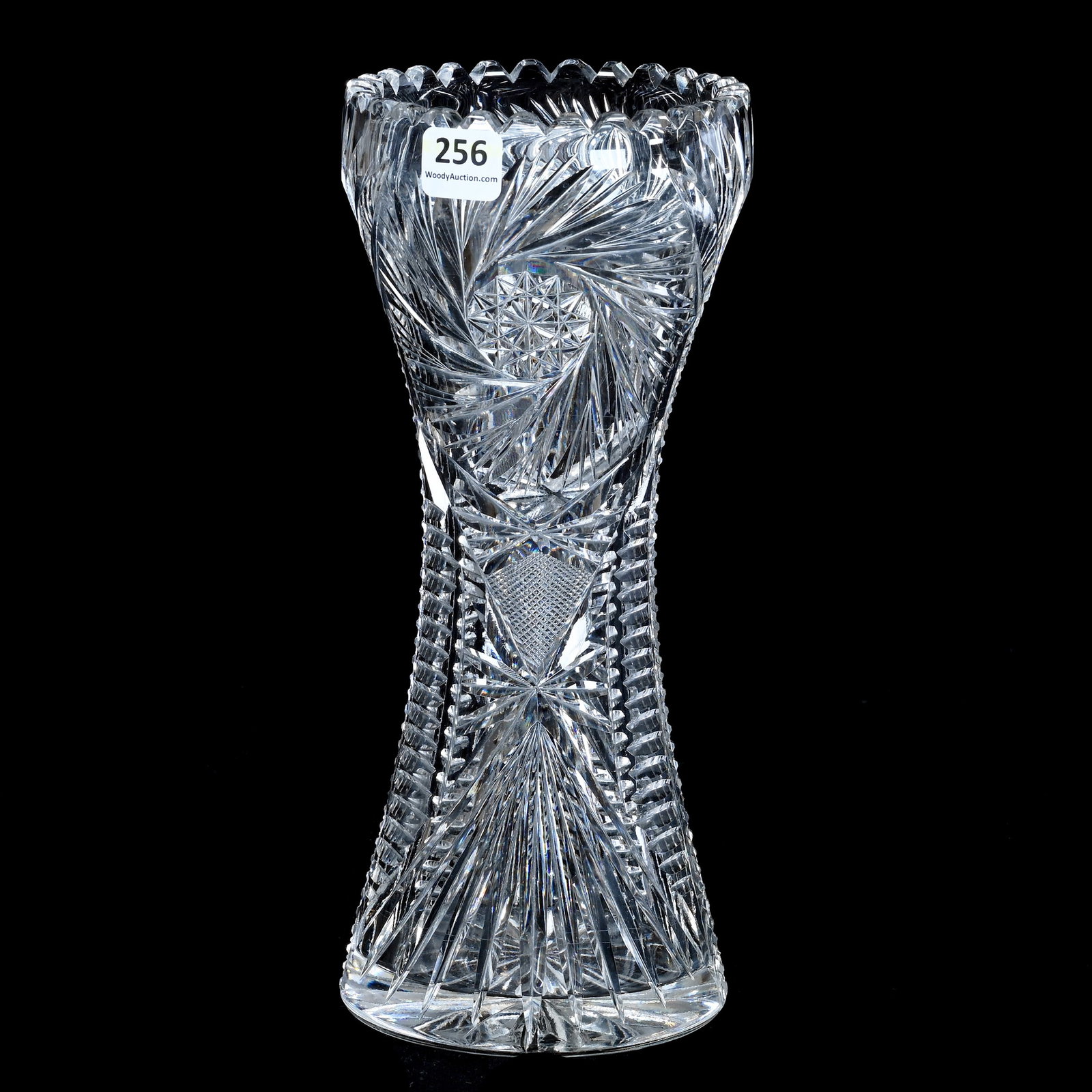 Vase, American Brilliant Cut Glass: Vase, American Brilliant Cut Glass, 9.75 x 4 x 4 Inches, Pinwheel, Crosscutting, Prism, Miter, And Fan Motif, Ray Cut Base, 3.1 Pounds, Mitchell Caughman Collection, Colorado. Effective 6/6/26, All Li