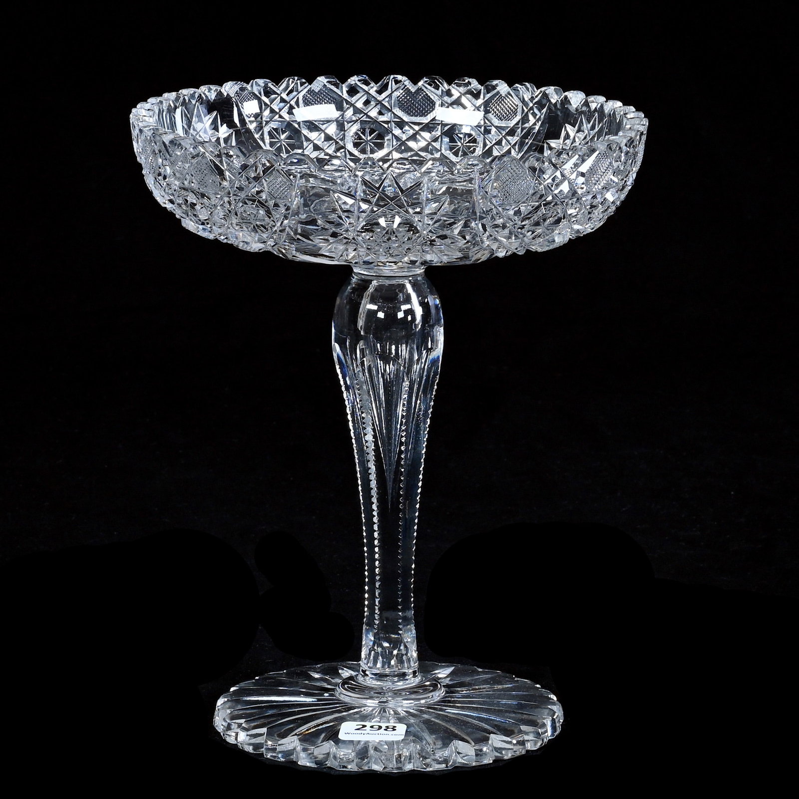 Compote, American Brilliant Cut Glass: Compote, American Brilliant Cut Glass, 8.5 x 7 x 7 Inches, Three Alternating Sections Of Hobstar, Cane, And Fan Motif, Scalloped Ray Cut Foot, 2.9 Pounds, Robert H. Meyer Estate Collection. Effective 