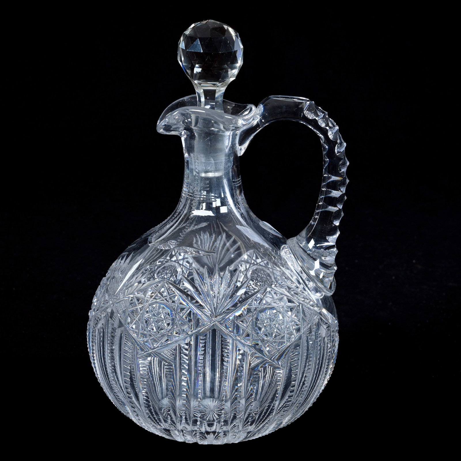 Ovoid Handled Decanter, American Brilliant Cut Glass, Hindoo Pattern By J. Hoare: Ovoid Handled Decanter, American Brilliant Cut Glass, Hindoo Pattern By J. Hoare, 9.5 x 5.75 x 4 Inches, Triple Notched Handle, Ray Cut Base, Pattern Numbered Stopper, Handle Crack, 3.5 Pounds, David 