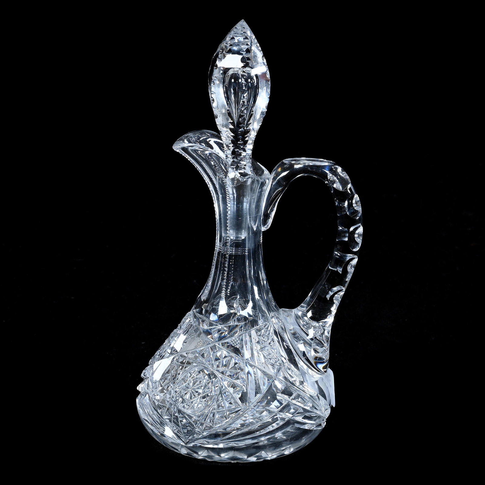 Cruet, American Brilliant Cut Glass, Genoa Pattern By Clark: Cruet, American Brilliant Cut Glass, Genoa Pattern By Clark, 7.75 x 4 x 3.5 Inches, Double Notched Handle, Hobstar Base, Spout Nick, 1 Pound, Mitchell Caughman Collection, Colorado. Effective 6/6/26, 