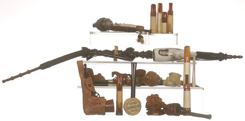 (20) ITEMS OF SMOKING RELATED ITEMS: (20) ITEMS OF SMOKING RELATED ITEMS INCLUDES (9) CIGAR HOLDERS IN ORIGINAL CASES WITH (1) MOTHER OF PEARL AND GOLD - PIPE WITH EBONY STEM AND PORCELAIN BOWL FEATURING PORTRAIT