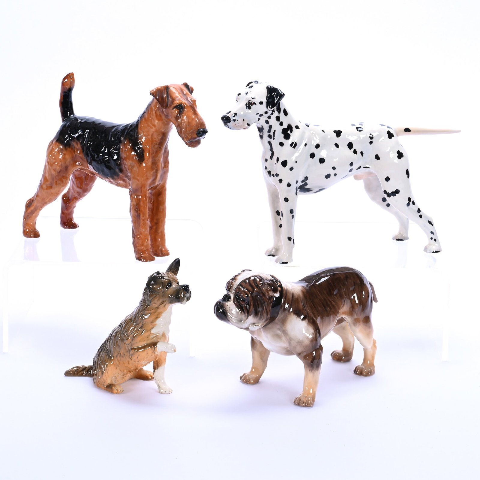 (4) Dog Figurines, Marked Royal Doulton: (4) Dog Figurines, Marked Royal Doulton, 8 x 12 x 3 Inches, (1) Dalmatian, Titled "Goworth Victor", Tail Restoration, (1) 8" X 10.25 Terrier Titled "Gotsford Topsail", Crack In Right Hind Leg, (1) 5.5