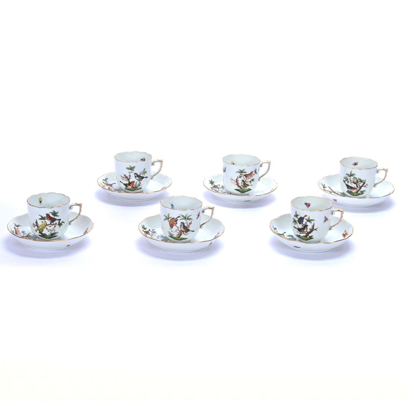 (6) Cups And Saucers, Marked Herend Porcelain: (6) Cups And Saucers, Marked Herend Porcelain, 2.75 x 5.5 x 5.5 Inches, (2) Saucers Marked #1726, (4) Saucers Marked #707, And (6) Cups Marked #707, 2.7 Pounds, Cliff And Myra Bilbo Collection, TN,