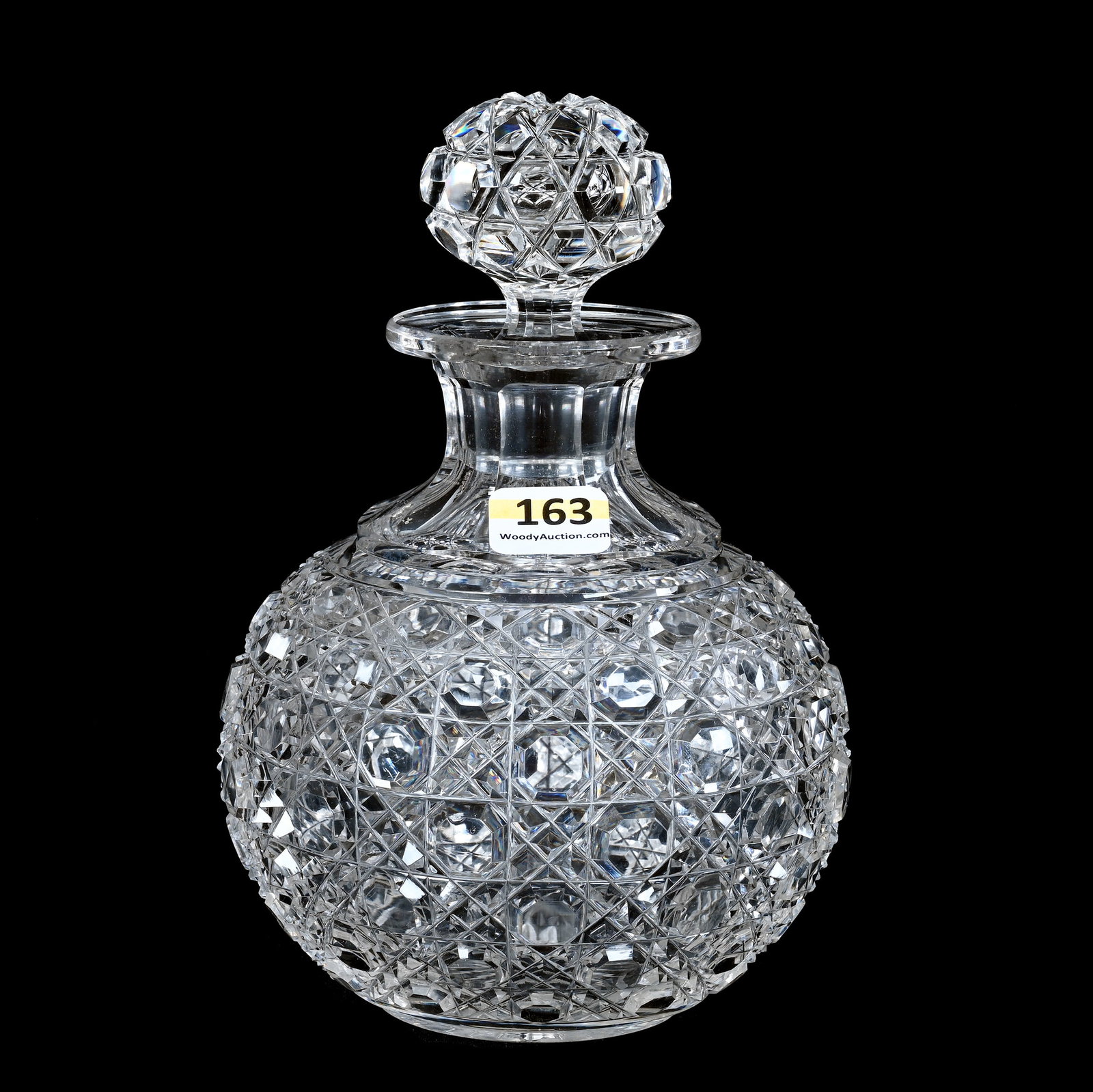Cologne Bottle, Brilliant Period Cut Glass: Cologne Bottle, Brilliant Period Cut Glass, 7 x 4.75 x 4.75 Inches, Cane Pattern With Pattern Cut Stopper, Ray Cut Base, 1.7 Pounds, John And Doris Carty Estate Collection, IA, Effective 6/6/26, All L