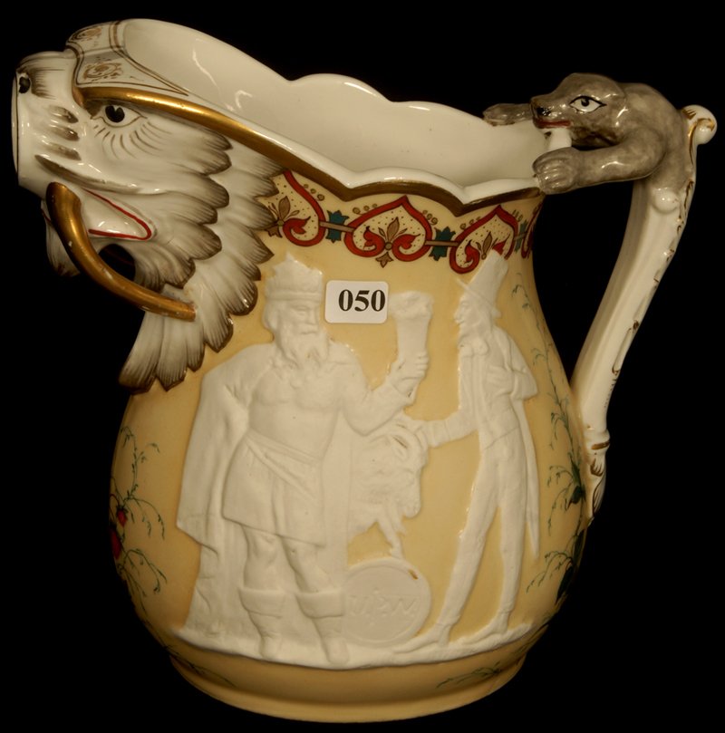 RARE 10" UNION PORCELAIN WORKS FIGURAL AND SCENIC PITCH: RARE 10" UNION PORCELAIN WORKS FIGURAL AND SCENIC PITCHER DESIGNED BY KARL L. H. MULLER - CIRCA 1880'S EAGLE HEAD MARK WITH S IN BEAK - YELLOW BACKGROUND WITH WHITE RELIEF FEATURING KING GAMBRINUS OFF