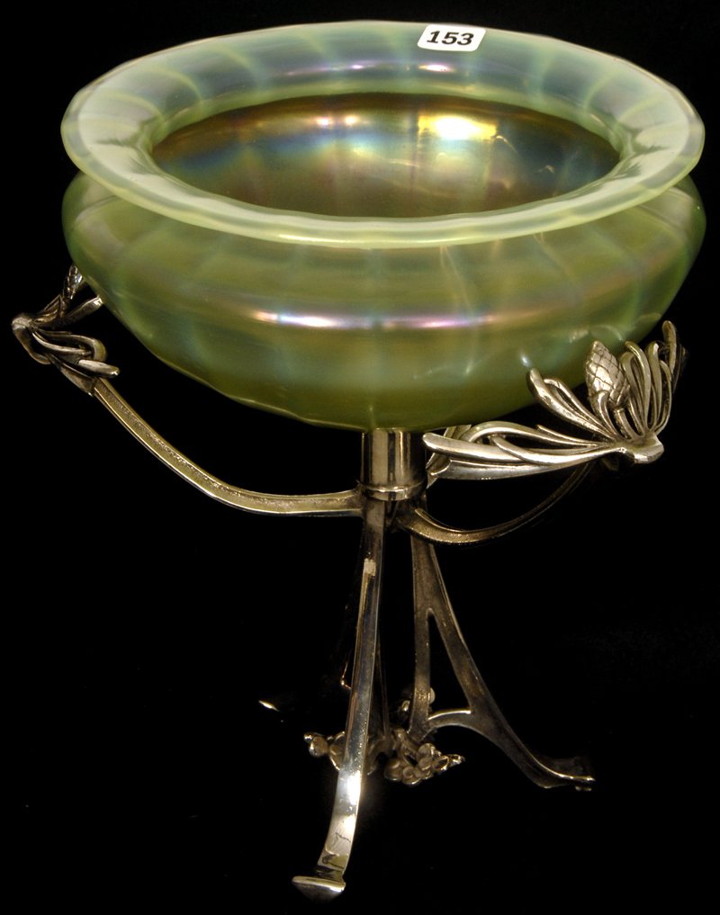 10 1/2" X 8 1/2" YELLOW IRIDESCENT ART GLASS BOWL SET O: 10 1/2" X 8 1/2" YELLOW IRIDESCENT ART GLASS BOWL SET ON FANCY SILVERPLATE FRAME THREE LEGGED BASE W/ PINECONE DESIGN - PERFECTLY FIT BOWL