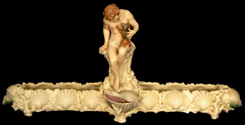 RARE 8 1/2" X 18" PHILLIPS & PEARCE FIGURAL TABLE CENTE: RARE 8 1/2" X 18" PHILLIPS & PEARCE FIGURAL TABLE CENTERPIECE FEATURES YOUNG BOY HOLDING DOG ON BED OF SEA SHELLS - PEARCE WAS TOP DESIGNER FOR THOMAS WEBB - CIRCA 1869 - PROFESSIONAL RESTORATION