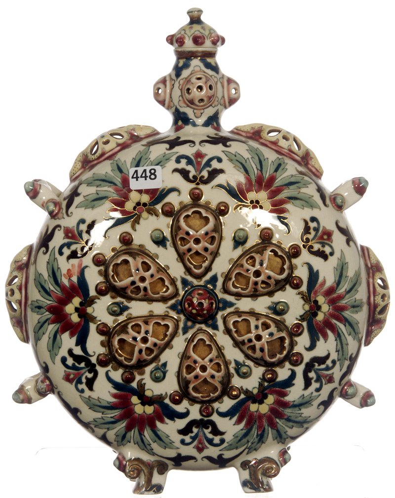 13" X 10 1/2" MARKED ZSOLNAY FLASK SHAPED TWO HANDLE WI: 13" X 10 1/2" MARKED ZSOLNAY FLASK SHAPED TWO HANDLE WINE DECANTER CREAM BACKGROUND WITH PINK, BLUE, BROWN AND YELLOW COLORED HIGHLIGHTS - ORIGINAL STOPPER - VERY NICE CONDITION