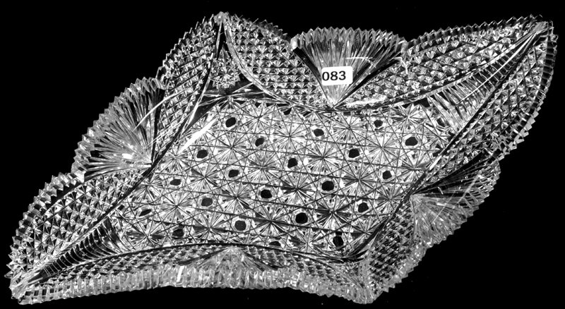 16 3/4" CUT GLASS ODD TUSK SHAPED IC: 16 3/4" CUT GLASS ODD TUSK SHAPED ICE CREAM TRAY RUSSIAN PATTERN CENTER W/ VESICA, DIAMOND & FAN BORDER - this piece is not American