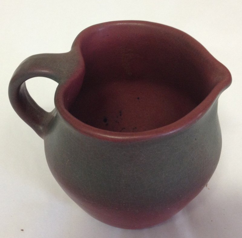 3 1/2" MARKED VAN BRIGGLE HEART SHAPED CREAMER: 3 1/2" MARKED VAN BRIGGLE HEART SHAPED CREAMER - MULBERRY MATTE FINISH - (MARKED VB IN BLOCK LETTER, COLO SPGS)