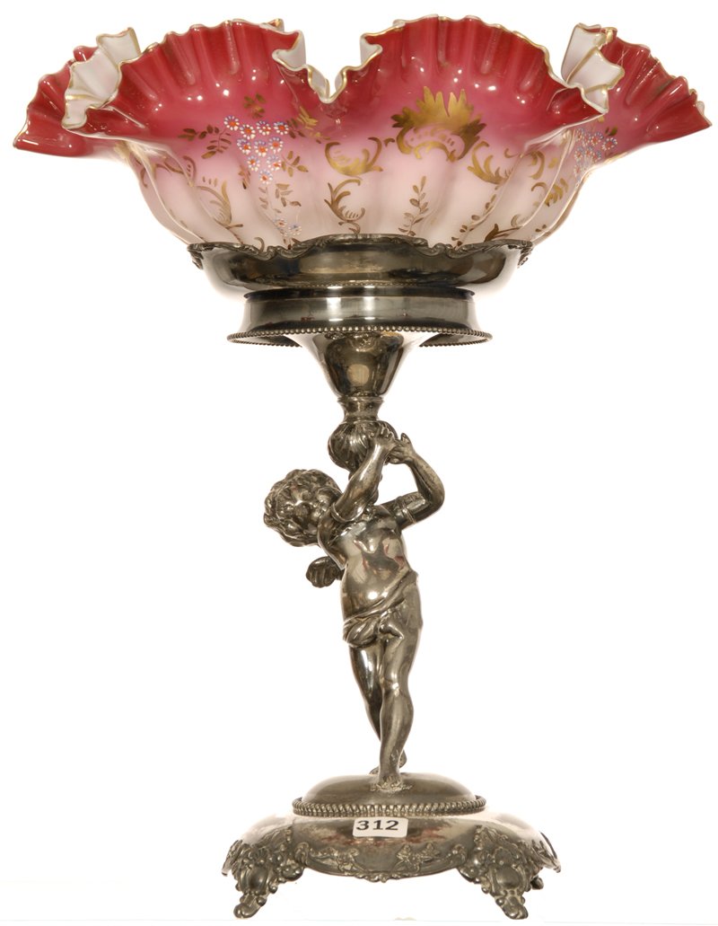 14 1/2" X 11 3/4" BRIDES BASKET: 14 1/2" X 11 3/4" BRIDES BASKET PINK CASED RUFFLED BOWL WITH ENAMEL FLORAL DECOR - SET ON FIGURAL CHERUB SILVERPLATE STAND