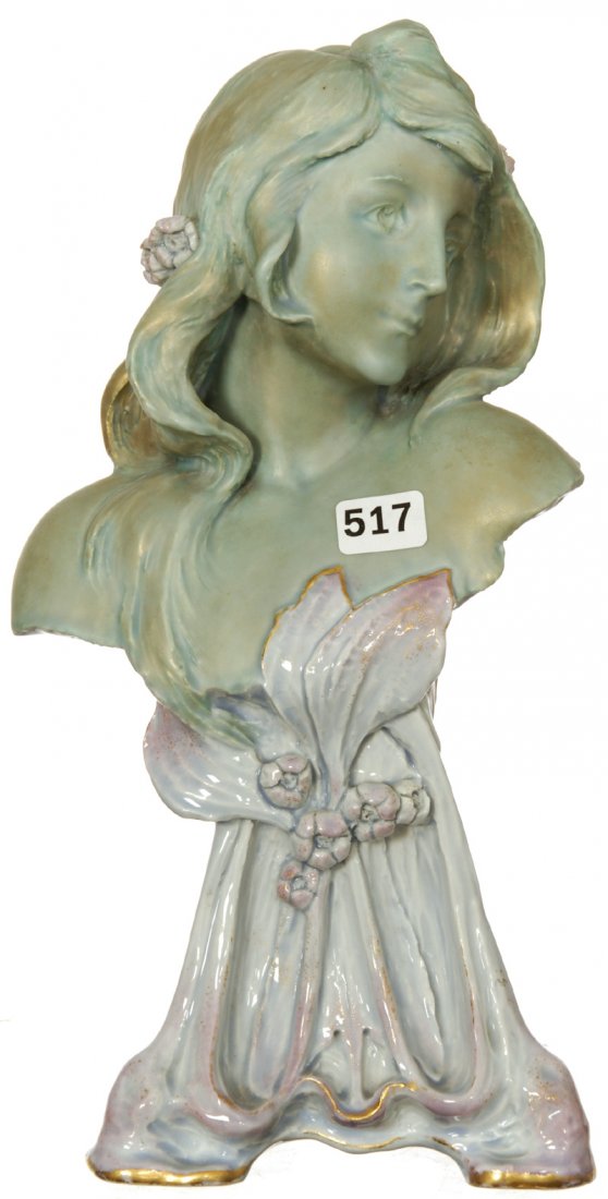 11 1/2" MARKED ERNEST WAHLISS AUSTRIAN ART NOUVEAU BUST: 11 1/2" MARKED ERNEST WAHLISS AUSTRIAN ART NOUVEAU BUST YOUNG FEMALE WITH IRIDESCENT GREEN AND GOLD TONES - GLOSSY PINK AND BLUE BASE - MODEL #4767